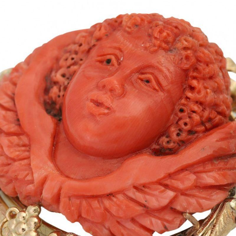Women's Fine Brooch, Especially with 1 Coral, Elaborately Engraved as a Putto For Sale