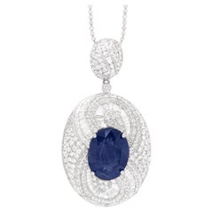 Fine Burma Sapphire 10.51 Carat Pendant with Diamonds 4.65 Carats Total 18K Gold