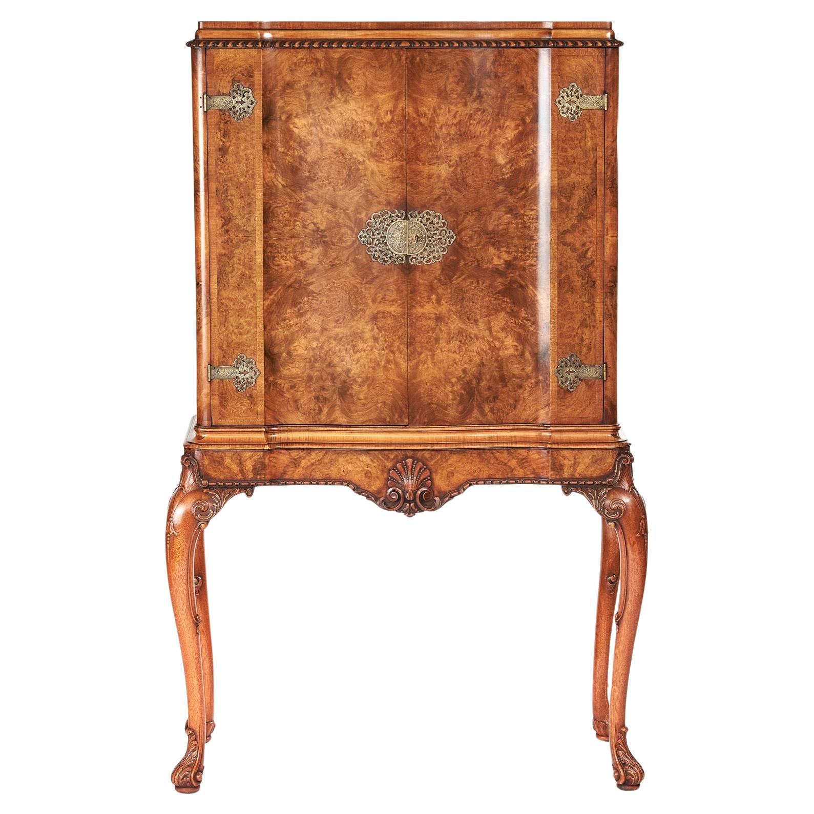 Fine Burr Walnut & Carved 2 Door Cocktail Cabinet On stand