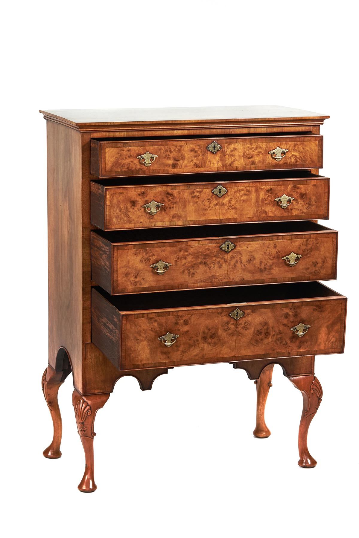 Fine Burr Walnut Revival 4 drawer chest circa 1920s
In the Manner of Queen Anne & George 1st
Burr Walnut Quarter veneer on top with cross banding,
4 Burr Walnut Graduated Drawers, with cock beading edges,
Oak Lined Drawers, 
Period Design Brass