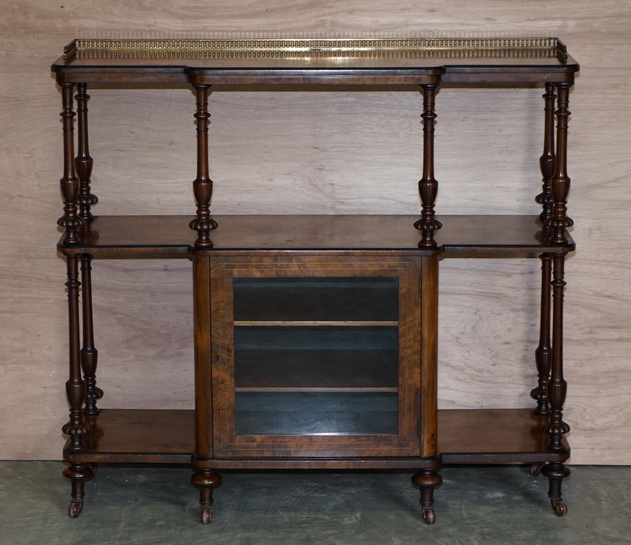 We are delighted to offer this very fine circa 1880 Burr walnut with Marquetry inlay, brass gallery rail and original porcelain castors, open library bookcase Etagere

A very decorative and well made piece, there is so much to see with this piece