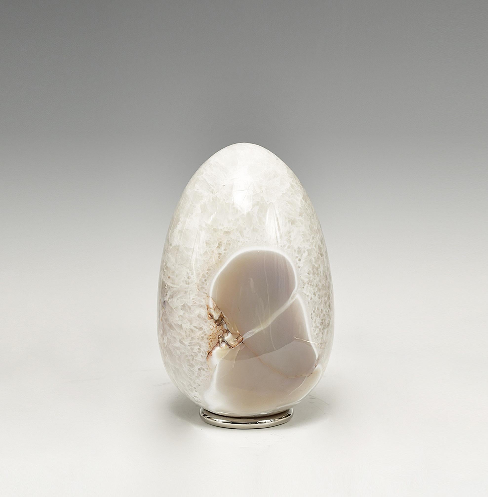 A natural agate sculpture with grotto.