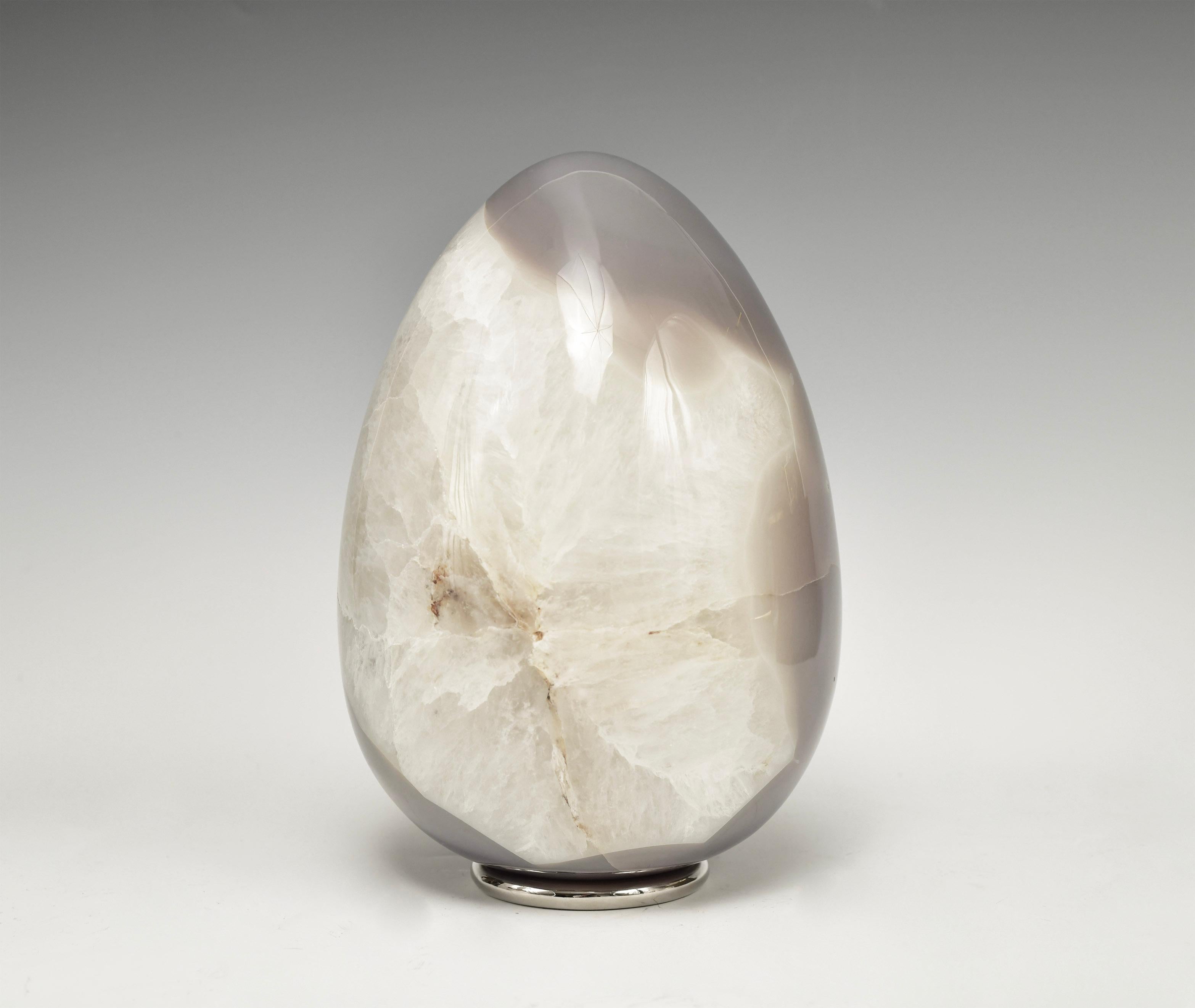 A natural agate sculpture with grotto.