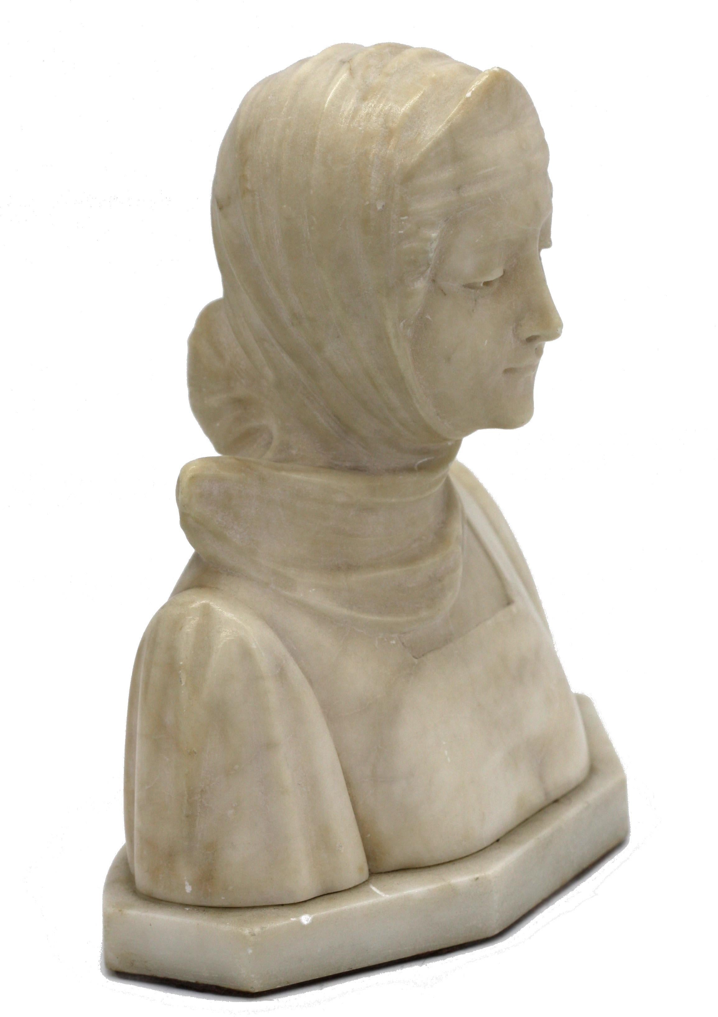 Fine Carved Alabaster Bust 
19th/20th century, the young beauty gazing, her hair pulled back beneath a scarf, on a rectangular plinth, with associated revolving stand. 

Measures: Height 8 in., (20 cm), 
76 in., 
Depth 5 in.

 