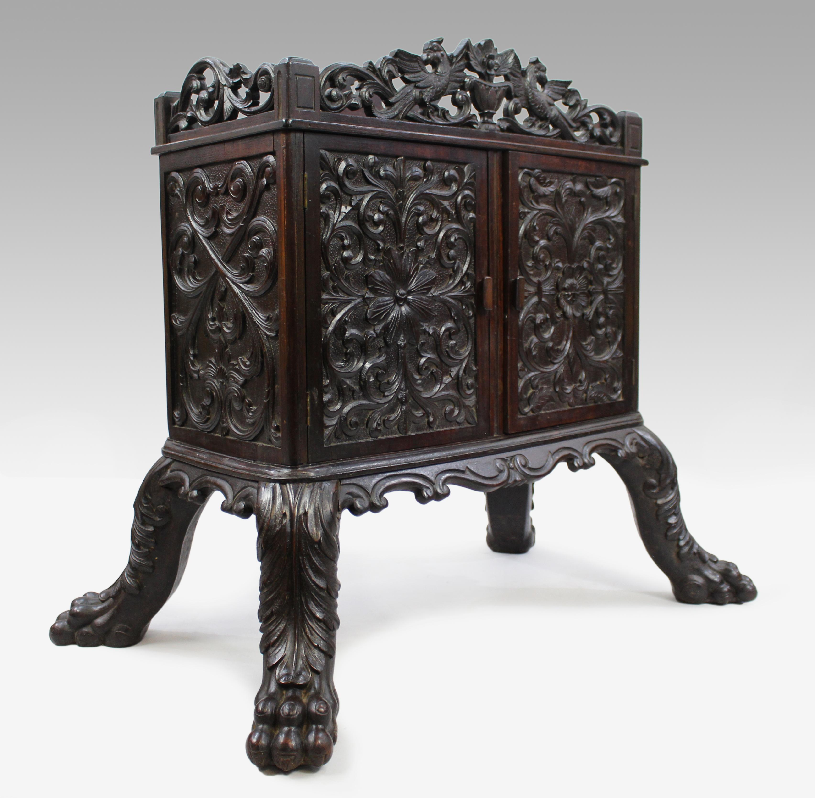 Fine carved early 19th c. Chinese cabinet

We are very pleased to offer a fine antique Chinese cabinet

Heavily carved to the whole with unique design to each panel. Carried on fine and crisp legs with carved animals feet 

Measures: Width: 94
