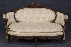 Fine Carved Rams Head and Garland Walnut Georgian Curved Back Sofa Settee