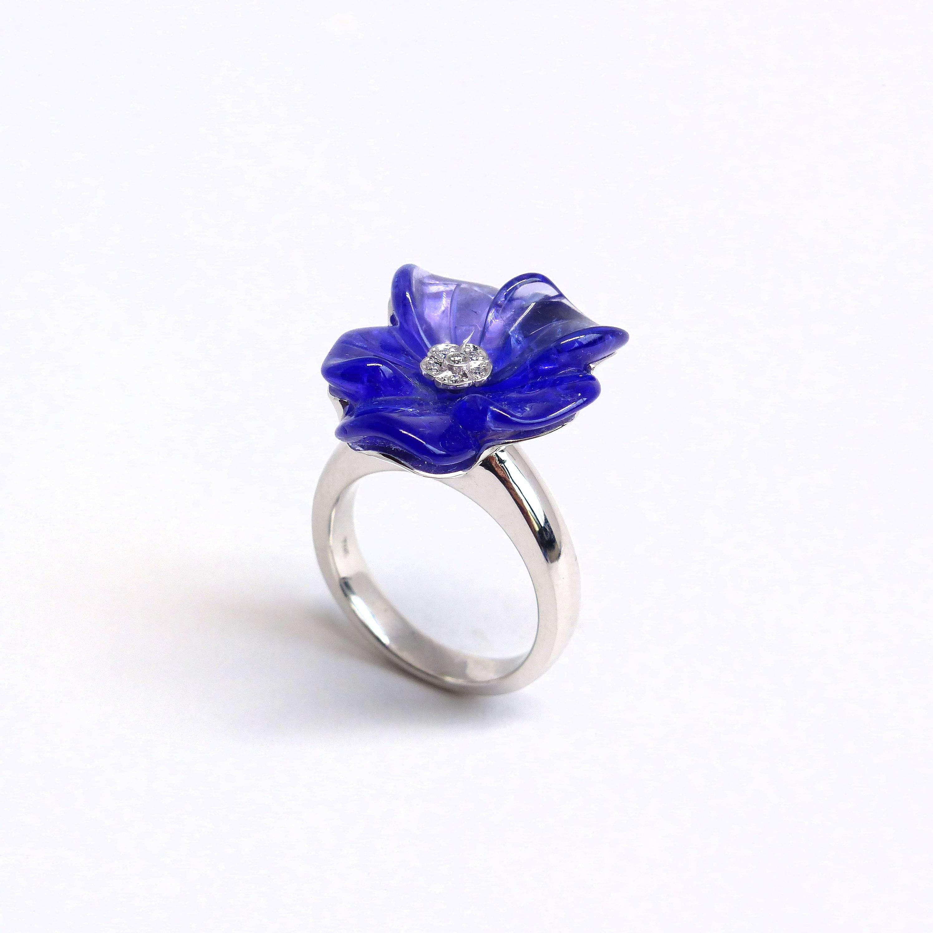 Thomas Leyser is renowned for his contemporary jewellery designs utilizing fine coloured gemstones and diamonds. 

This ring in 18k white gold is set with a Tanzanite carved and engraved like a flower (14.39ct) and brilliant cut Diamonds in the