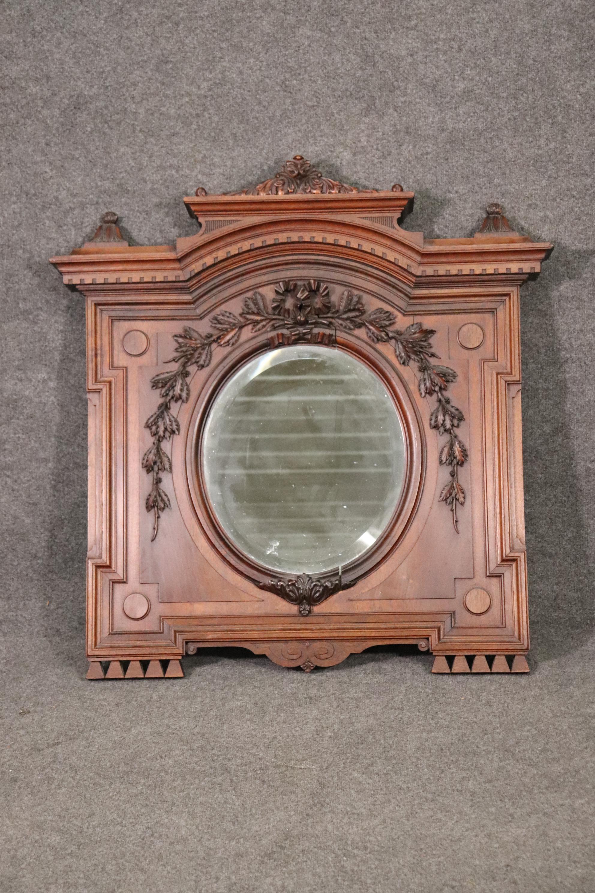 This is a gorgeous smaller, squarish mirror for certain spaces on certain walls in certain rooms. This mirror has phenomenal carved details and is quite beautiful for such a compact design. The mirror measures approximately 39 tall x 38 wide x 5 and