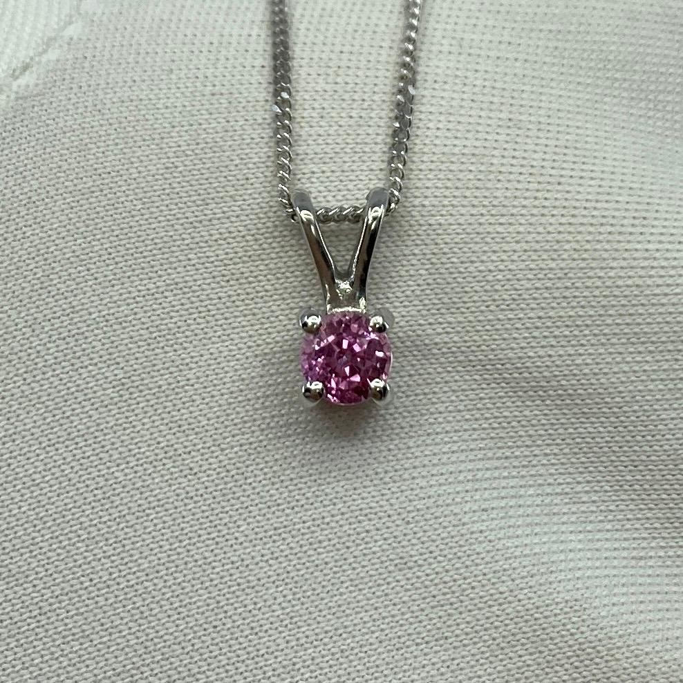 Fine Pink Ceylon Sapphire Round Cut 18k White Gold Solitaire Pendant.

0.40 Carat sapphire with a beautiful fine pink colour and excellent clarity, very clean stone. Also has an excellent round brilliant cut showing lots of light return and