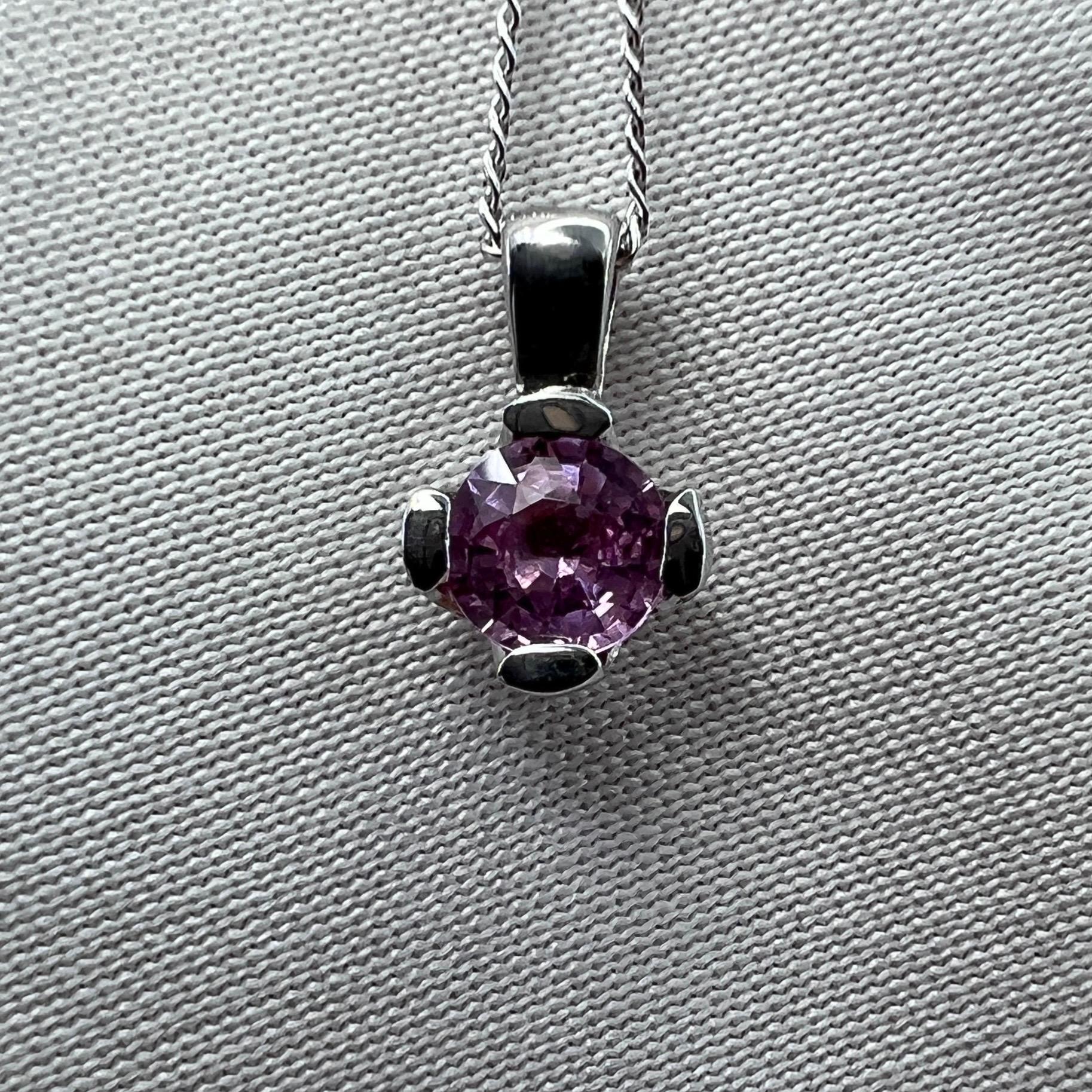 Fine Pink Ceylon Sapphire Round Cut 18k White Gold Solitaire Pendant.

0.35 Carat sapphire with a beautiful fine pink colour and excellent clarity, very clean stone. Also has an excellent round brilliant cut showing lots of light return and