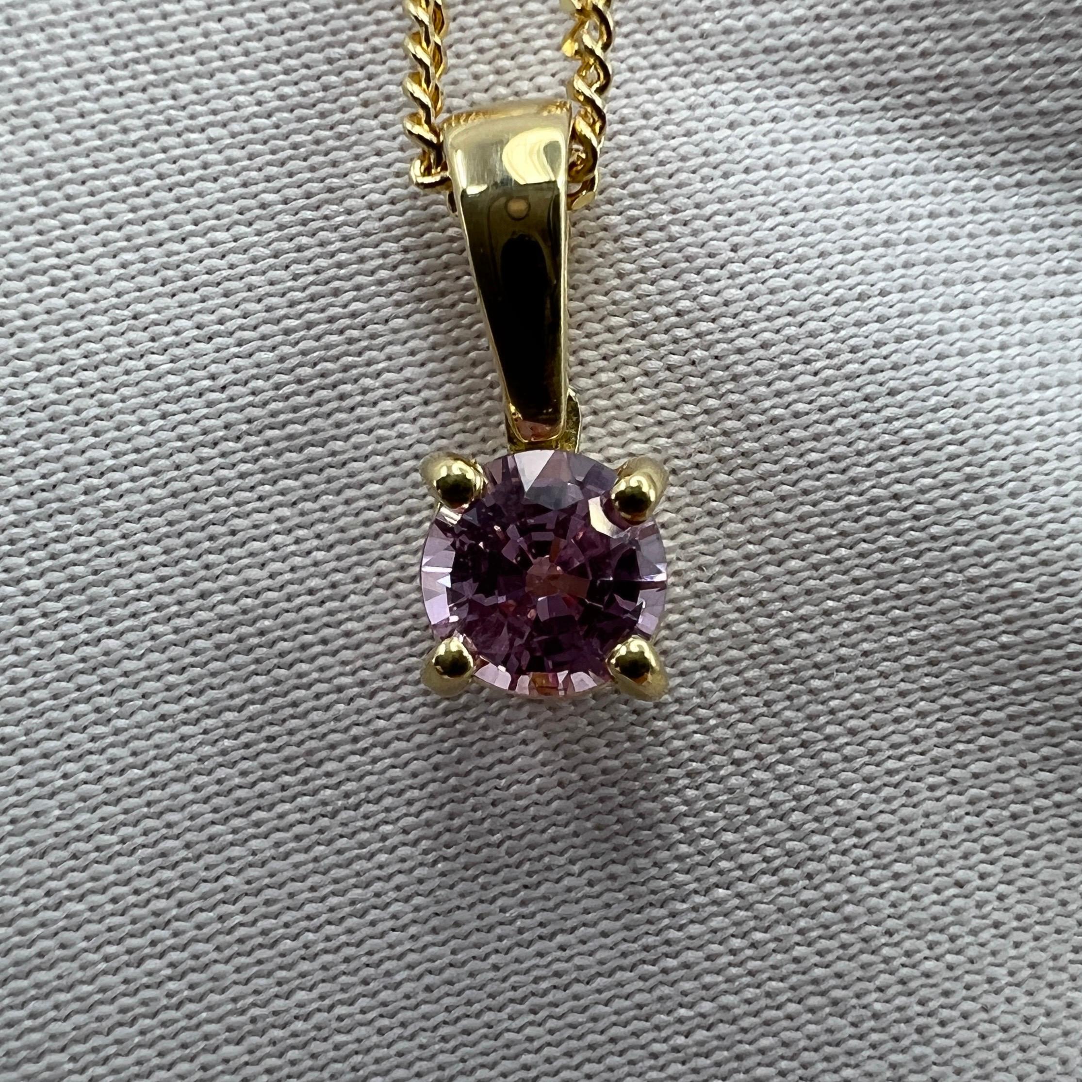 Fine Pink Ceylon Sapphire Round Cut 18k White Gold Solitaire Pendant.

0.40 Carat sapphire with a beautiful fine pink colour and excellent clarity, very clean stone. Also has an excellent round brilliant cut showing lots of light return and