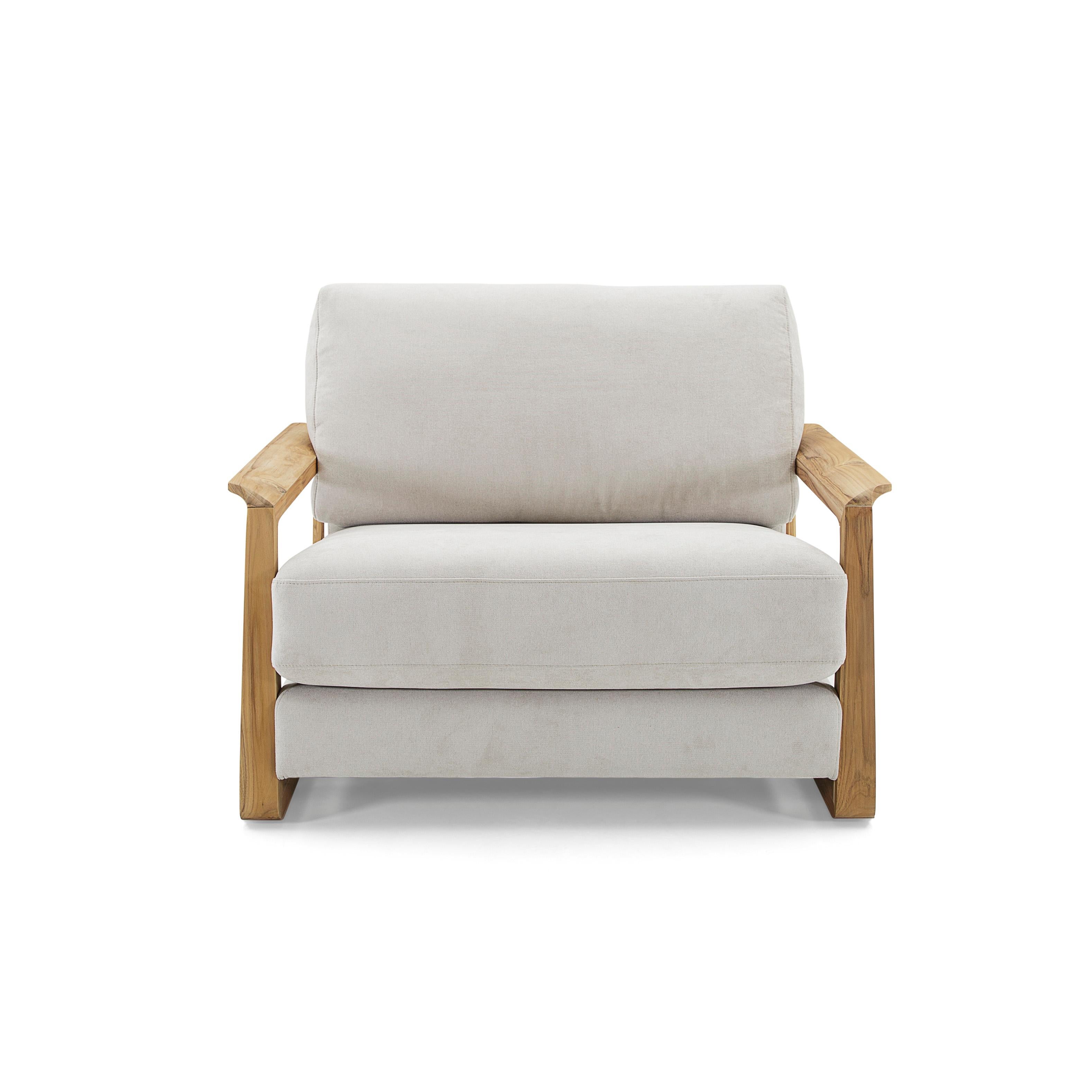 The Fine contemporary armchair upholstered in a stunning oatmeal fabric and its arms in a teak wood finish, is the perfect combination for your living room. As relaxing as it looks, the actual seat is even better. This armchair is the perfect