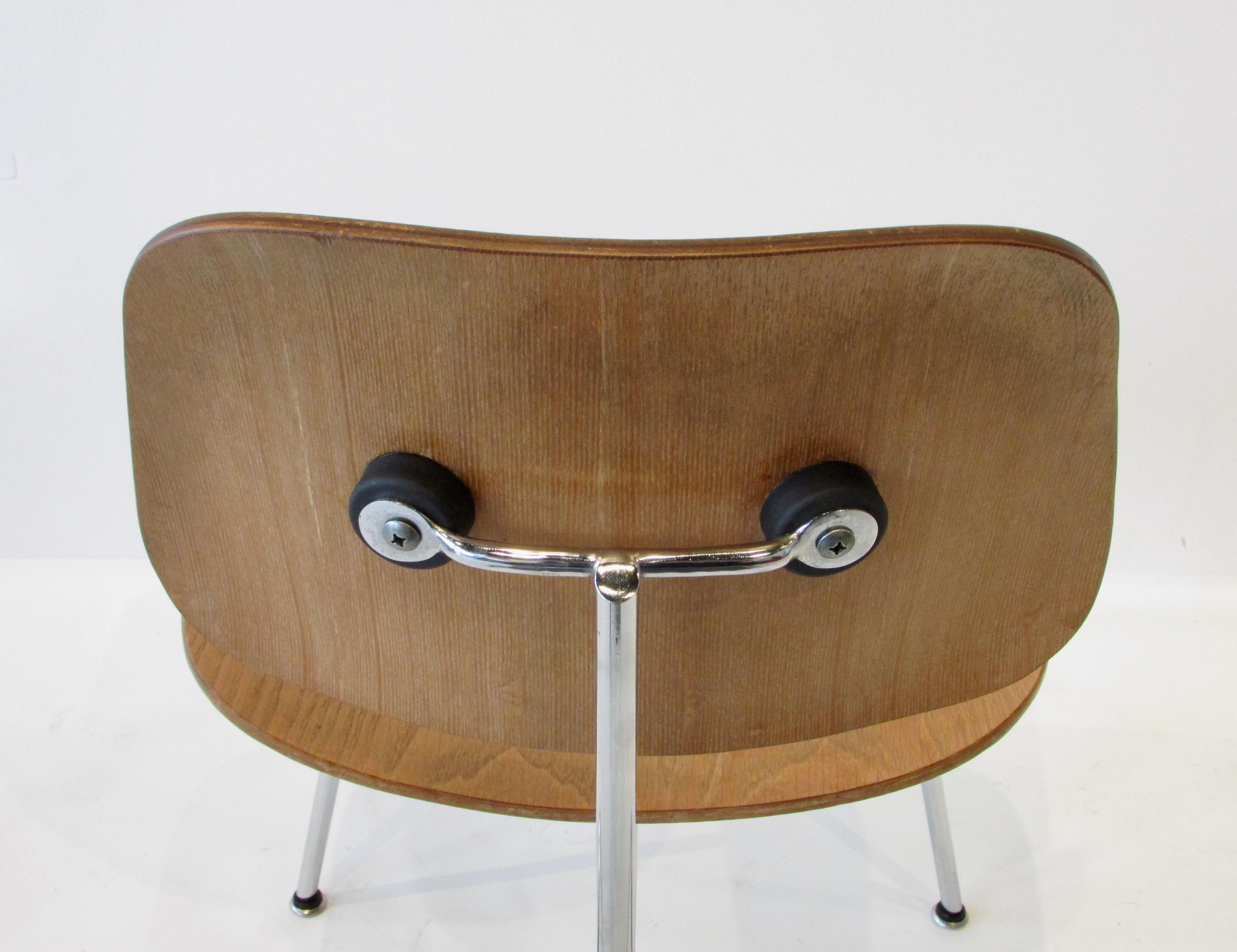 Chrome Fine Charles Eames for Evans Sold by Herman Miller Ash Grain DCM Dining Chair For Sale