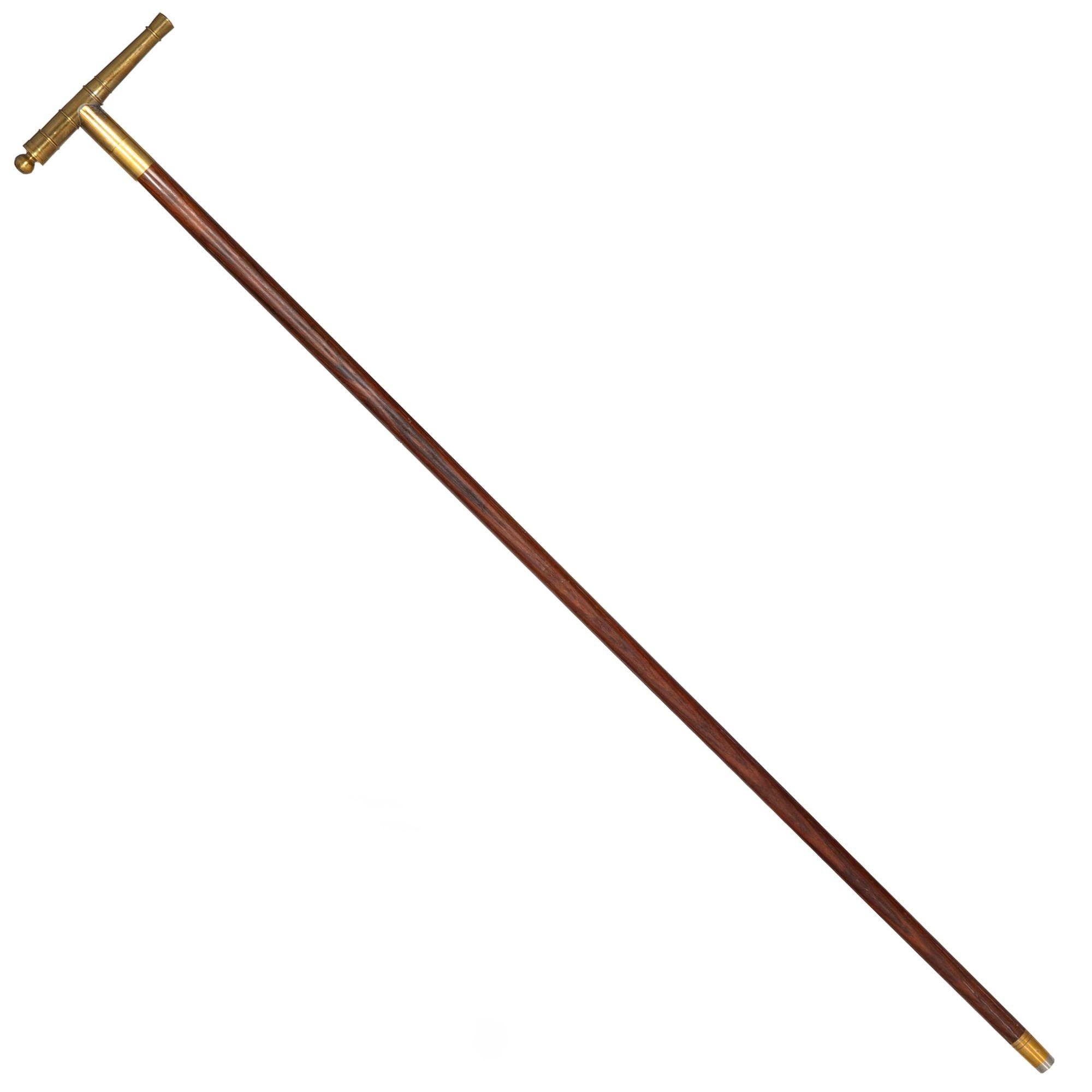 A FINE CHEROOT BRASS SIGNAL CANNON CANE WITH ROSEWOOD SHAFT
20th century

36 1/4