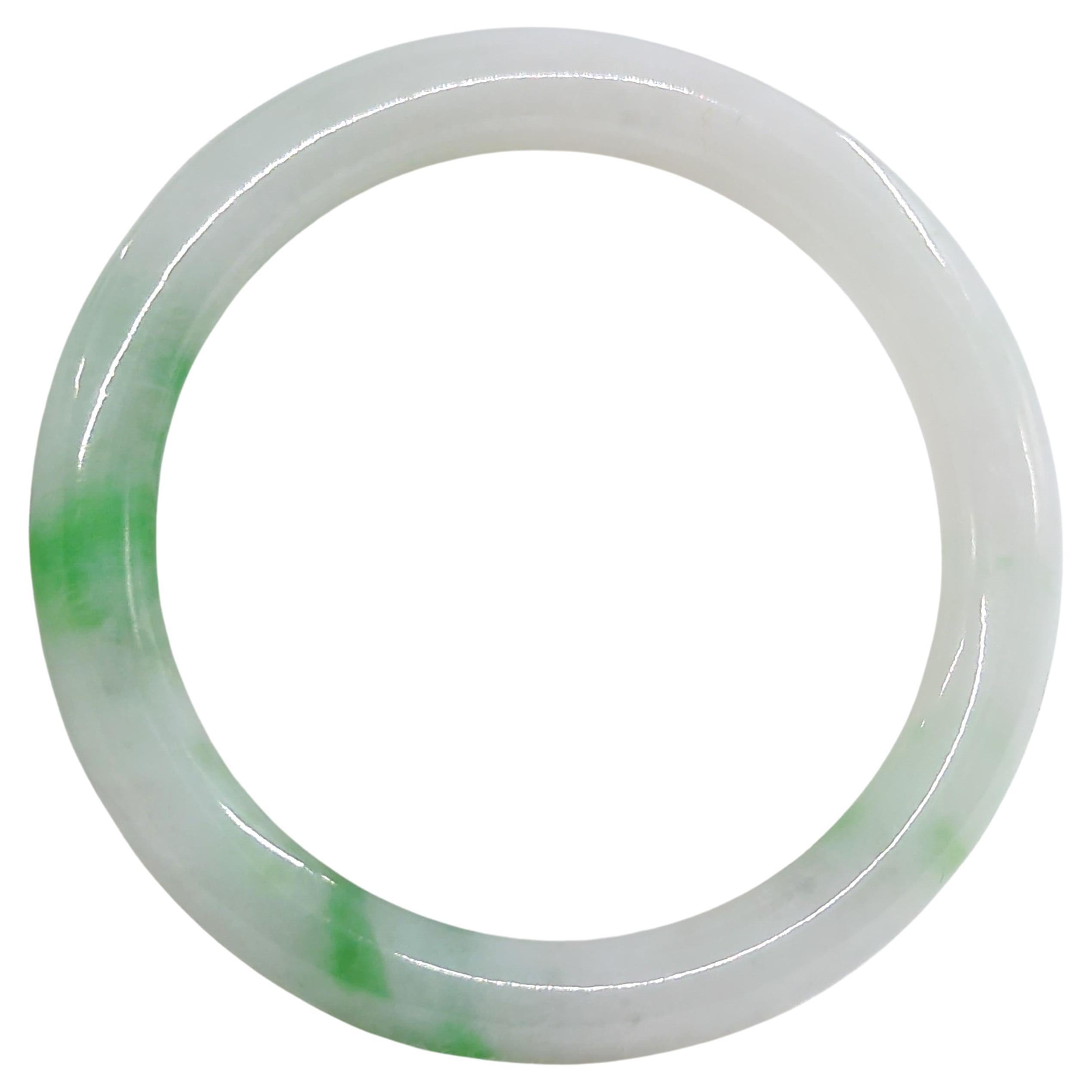 Women's Fine Chinese Carved White Jadeite Bangle Apple Green Inclusions Small 53.5mm ID For Sale