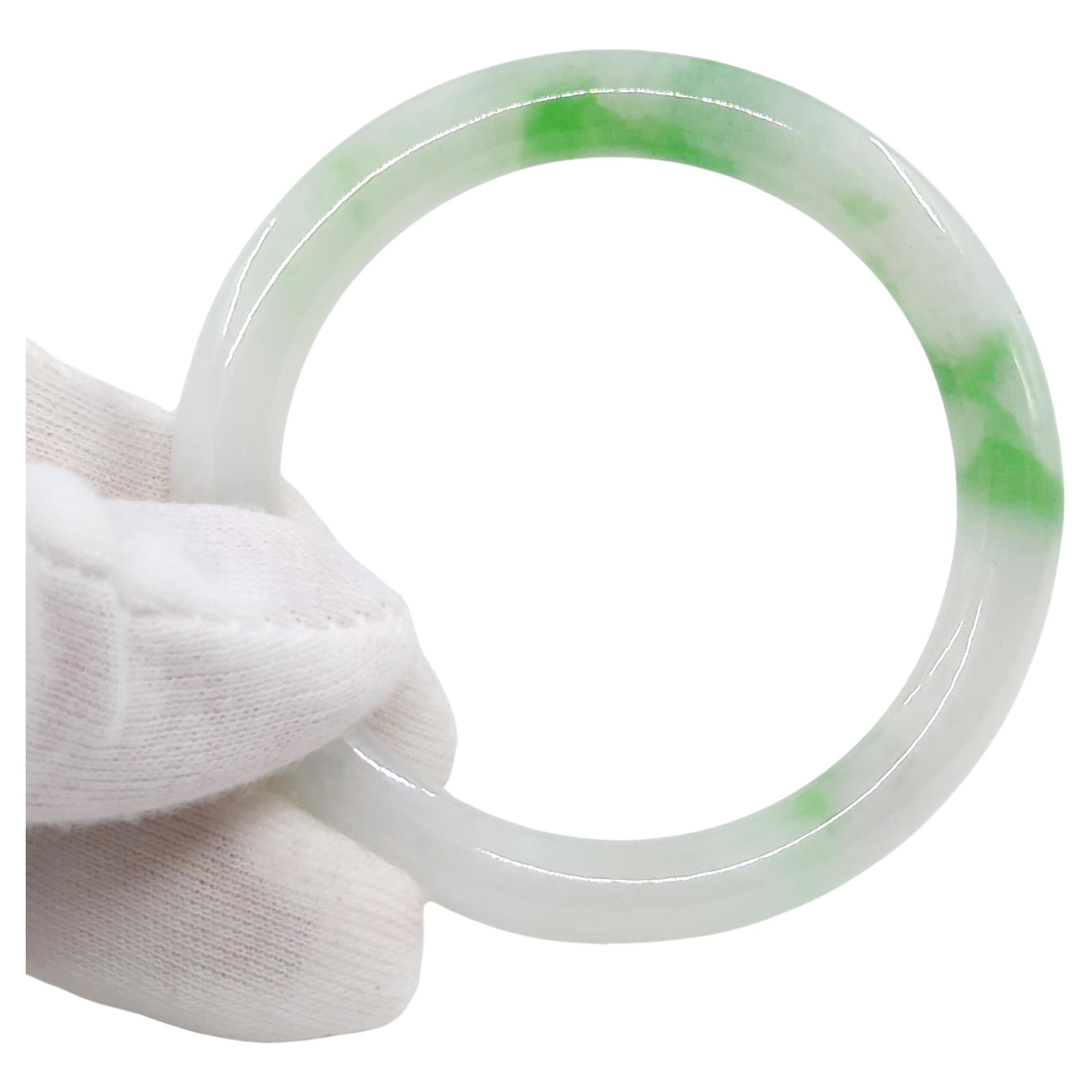 Fine Chinese Carved White Jadeite Bangle Apple Green Inclusions Small 53.5mm ID For Sale