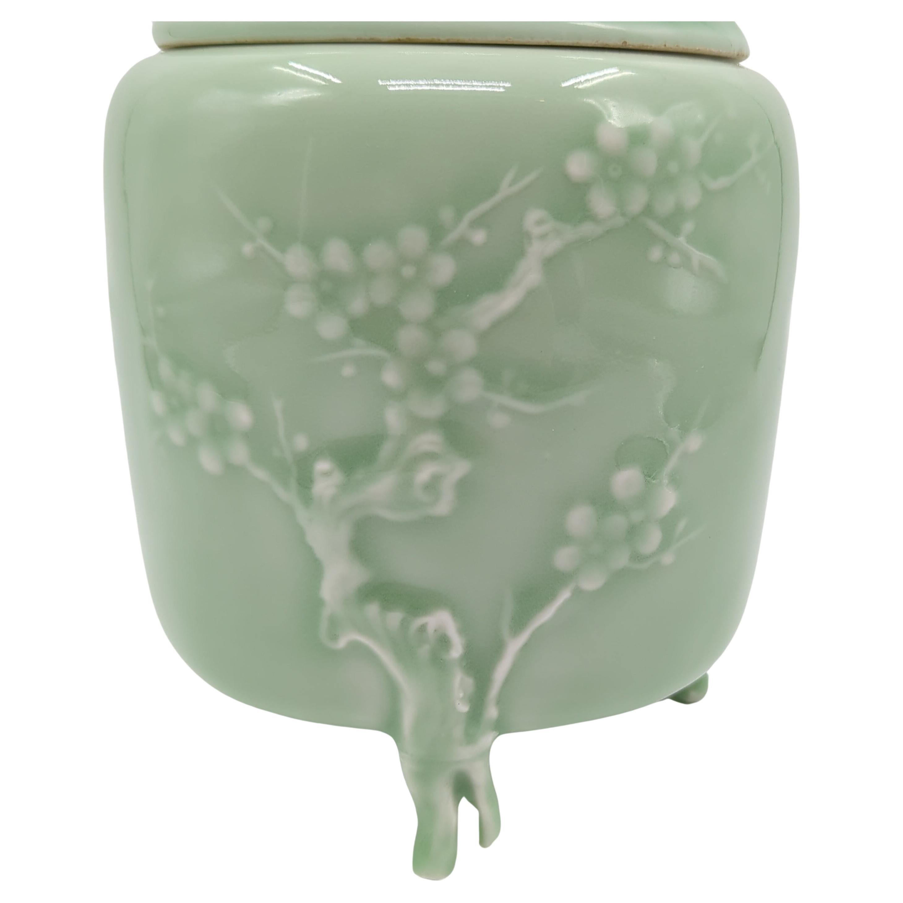 20th Century Fine Chinese Celadon Glaze Relief Carved Covered Censer on Tripod Feet mid-20c For Sale