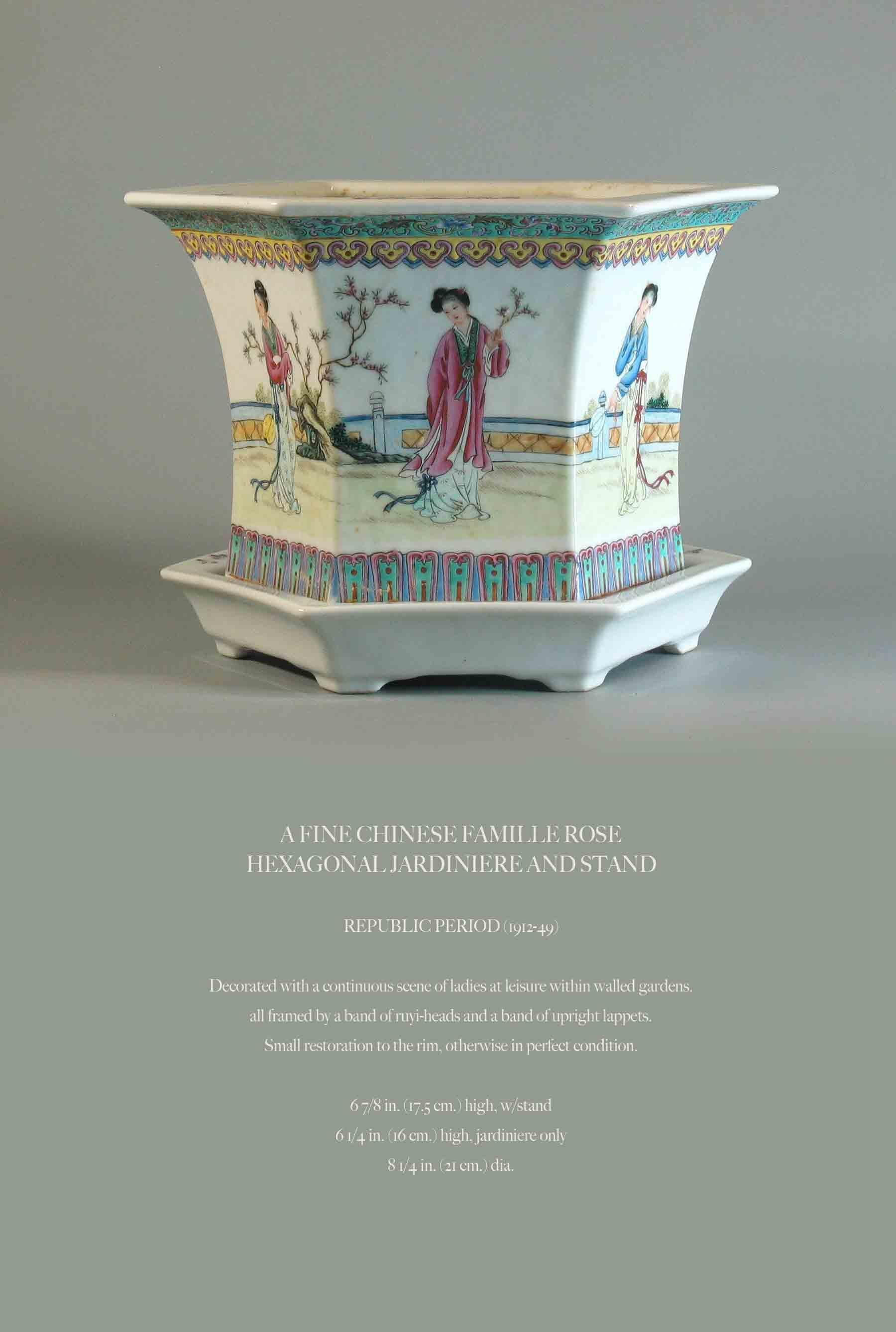 A fine Chinese Famille Rose
Hexagonal jardiniere and stand.

Republic Period (1912-1949).

Decorated with a continuous scene of ladies at leisure within walled gardens.
All framed by a band of ruyi-heads and a band of upright lappets.
Small