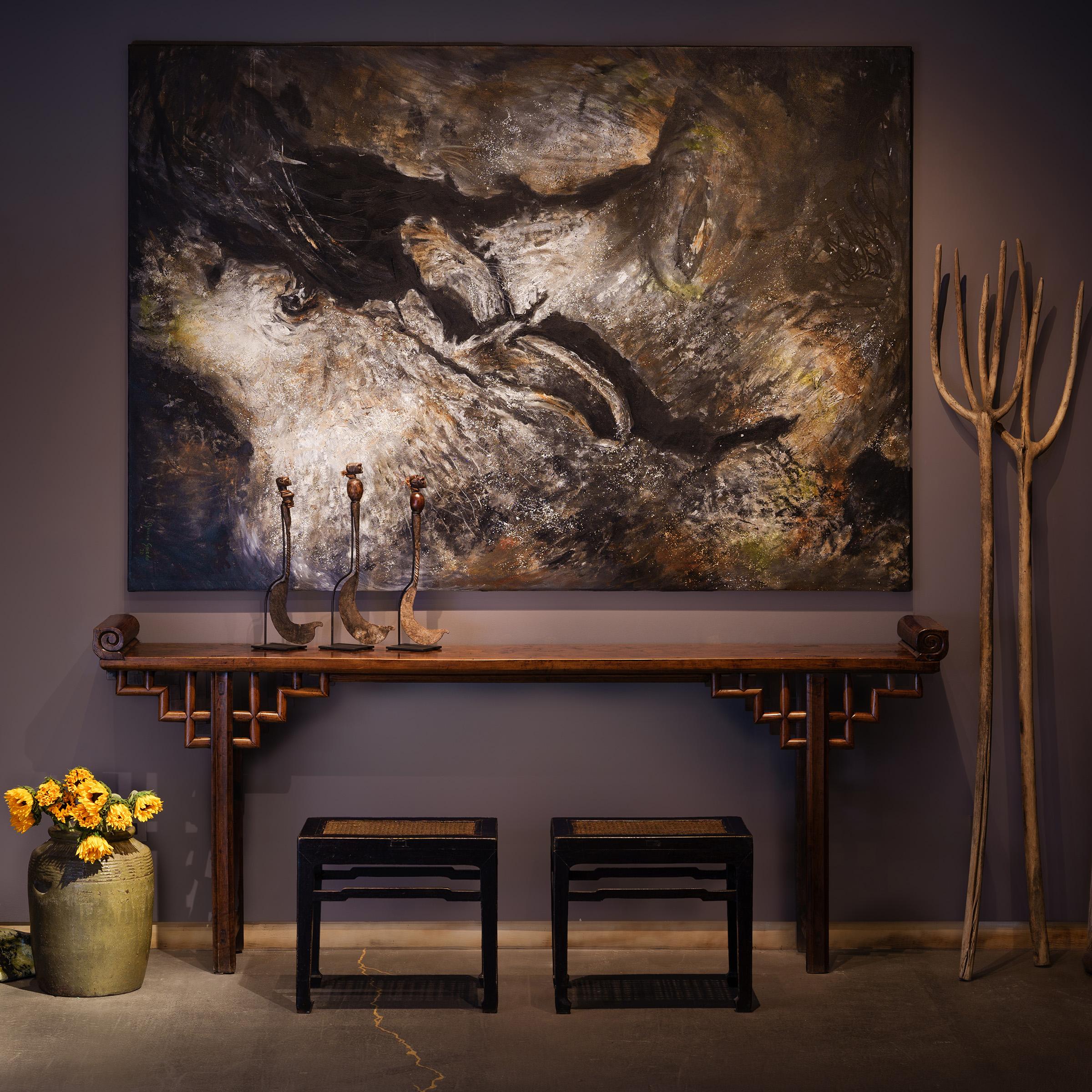 In households throughout China, long tables with everted ends were commonly placed against the back wall of the main room as an altar where ancestral tablets, Buddhist or Daoist iconography, and ceremonial offerings were placed. 

This fine altar
