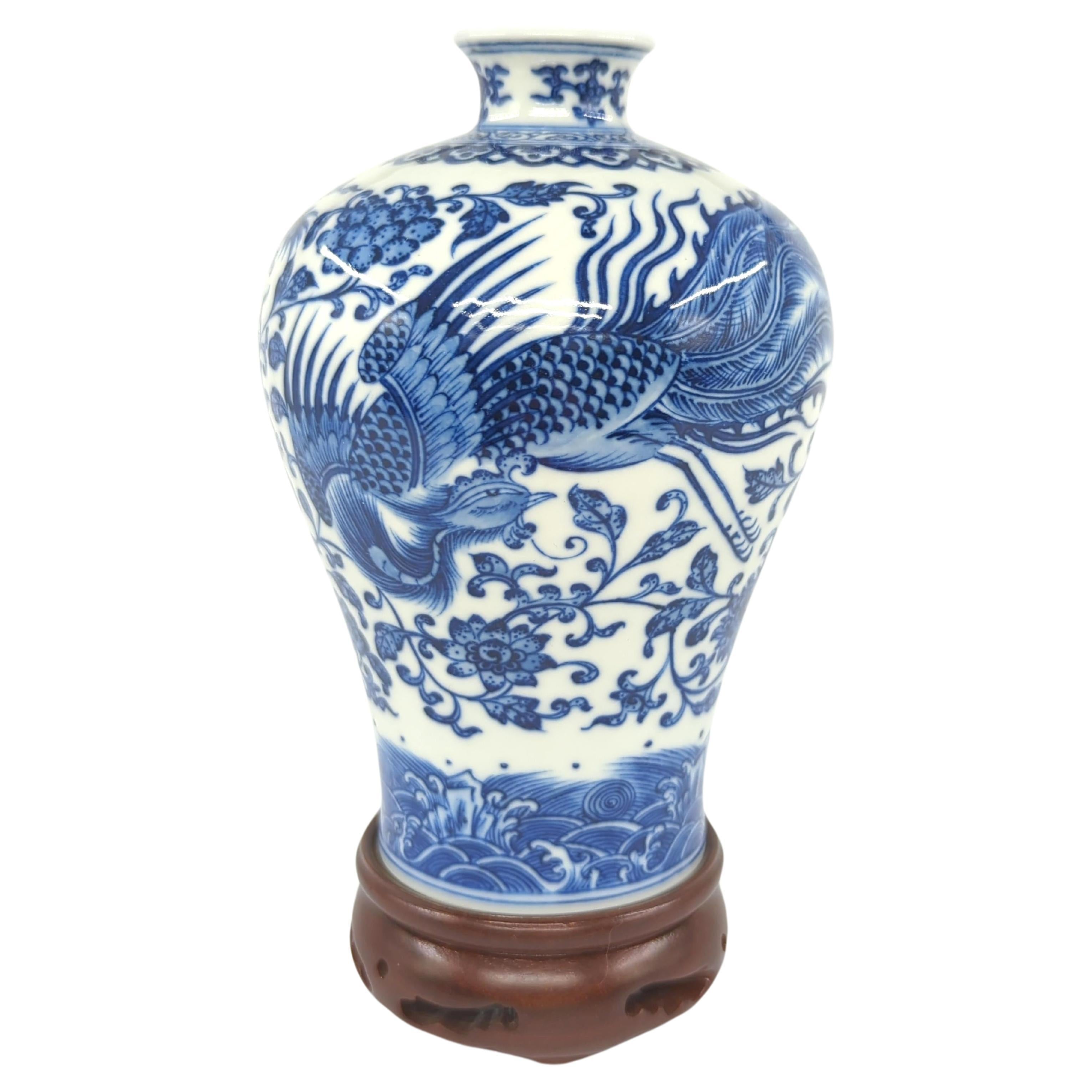 This Chinese blue and white Meiping vase is not only a masterful example of ceramic artistry but also a tribute to traditional craftsmanship. Meticulously hand-painted and exceptionally well-potted, the vase was fired in a traditional pine