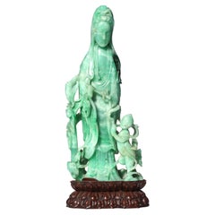 Fine Chinese Transparent Emerald and Pale Green Jadeite Quanyin