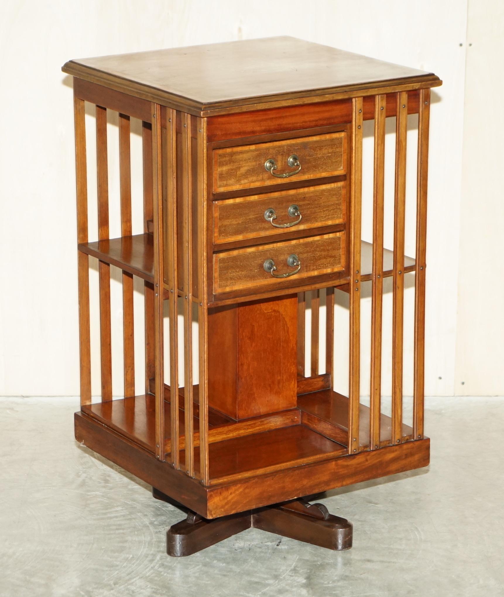 We are delighted to offer for sale this exhibition quality English Walnut with Satinwood inlay, circa 1880 revolving bookcase table with exquisitely finished top and very rare small drawer section.

A good looking and well made piece, this is the