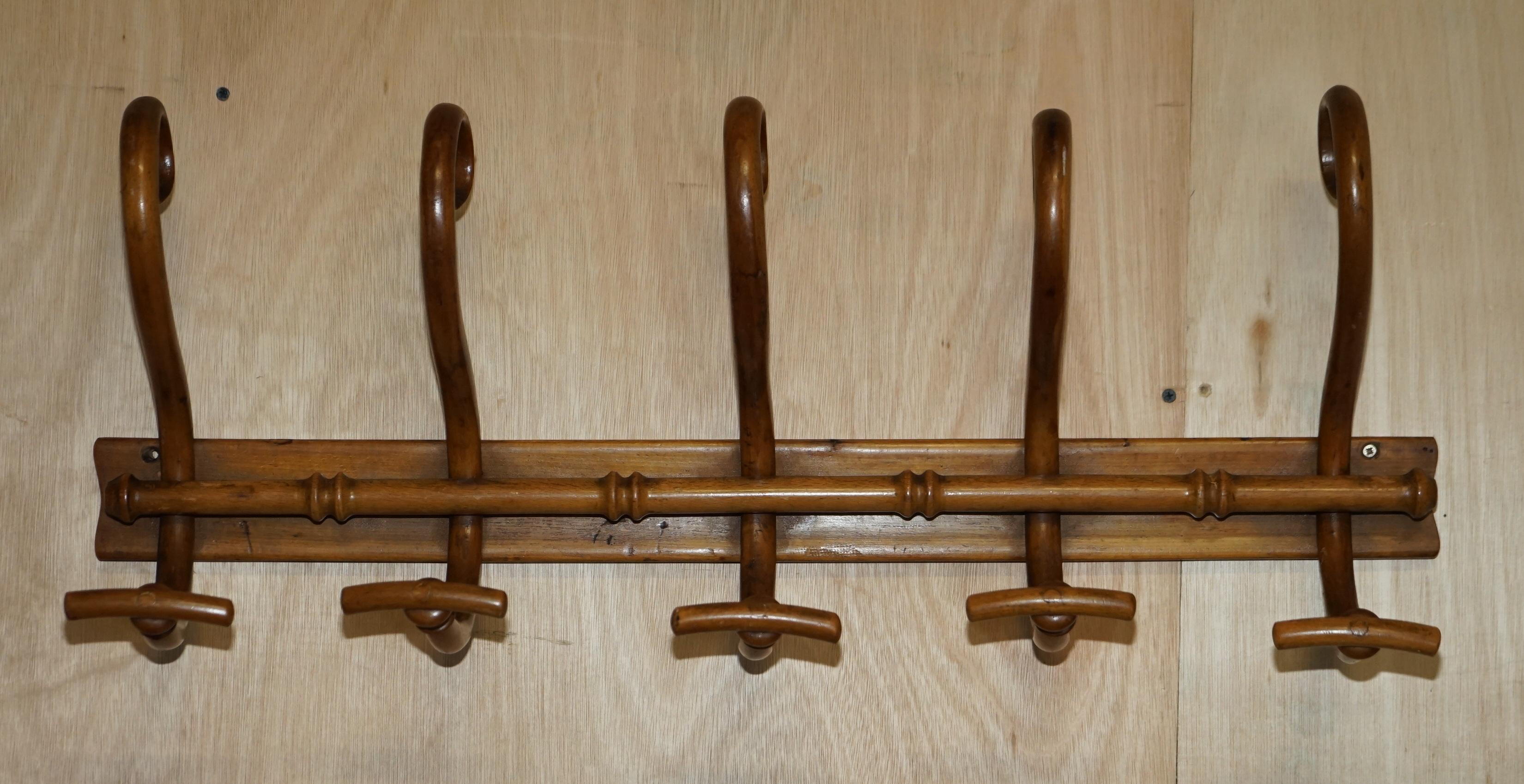 We are delighted to offer for sale this stunning antique circa 1920’s Thonet Bentwood wall mounted coat rack

A truly stunning piece, if you have ever seen this type of coat rack in the form of a wall mounted rack of the floor standing examples,