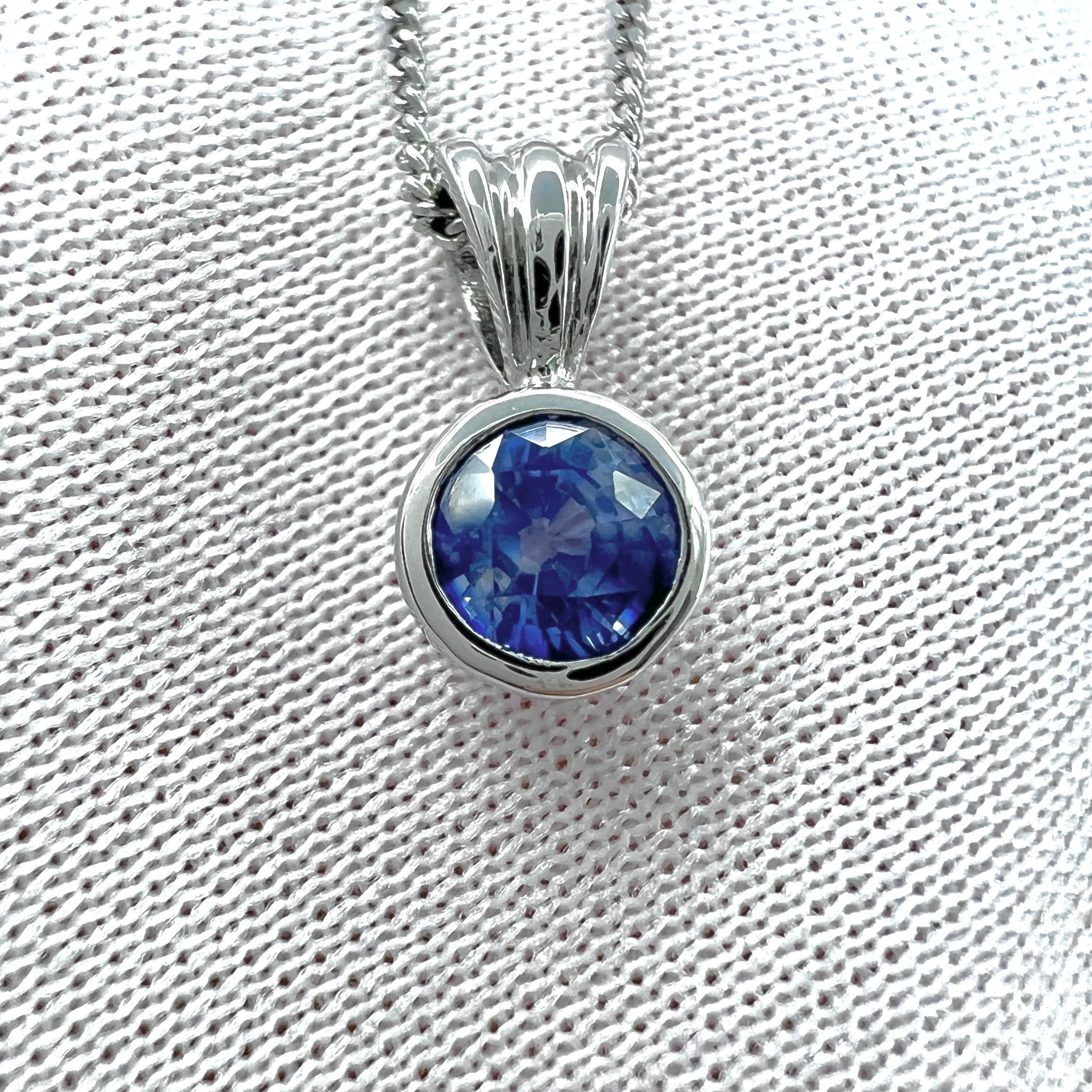 Fine Cornflower Blue Ceylon Sapphire 18k White Gold Round Cut Bezel Rubover Pendant Necklace.

0.85 Carat sapphire with a beautiful vivid cornflower blue colour and excellent clarity, a very clean stone.
Mined in Sri Lanka, source of some of the