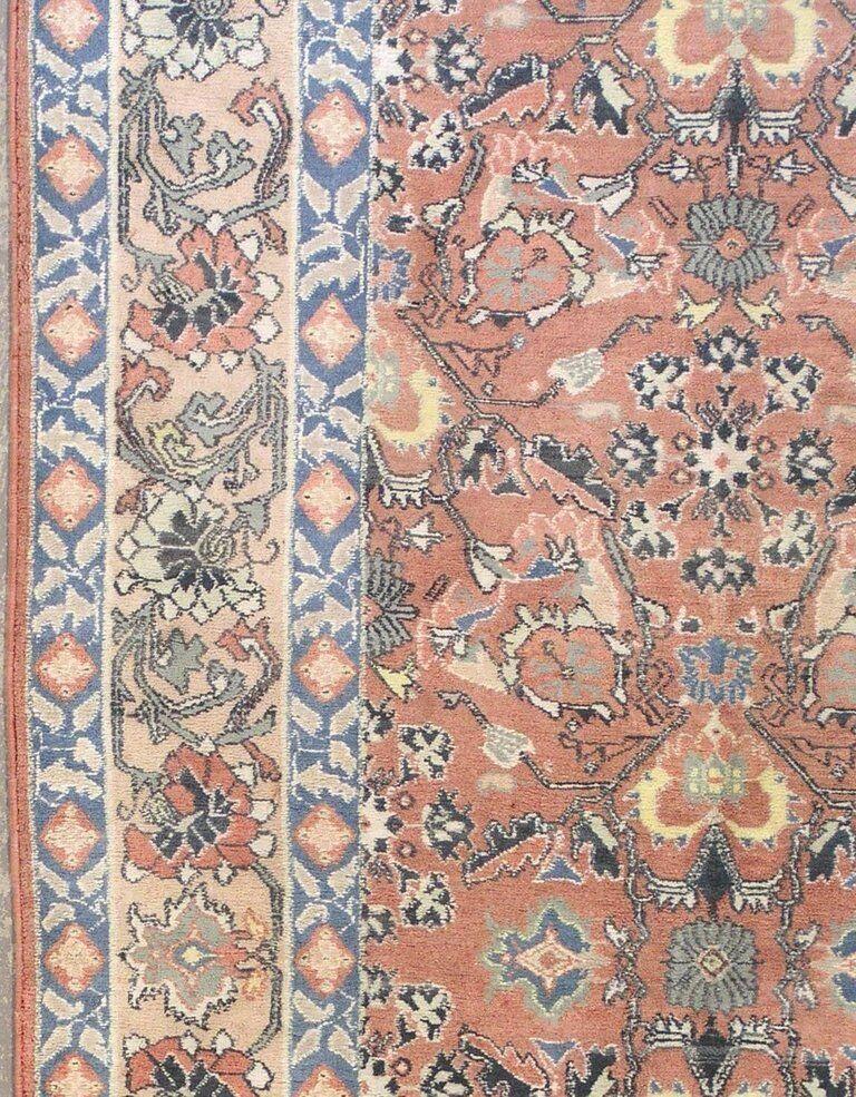 Hand-knotted cotton pile on a cotton foundation - Approximately 200 KPSI.

Circa 1920 

Dimensions: 6' x 9' 

Origin: India 

Condition: Excellent 

Field Color: Rust 

Border Color: Peach