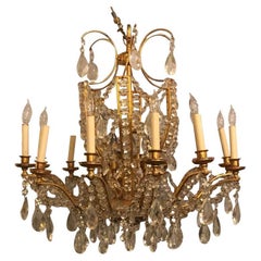 Lustre néoclassique à dix-huit lumières en cristal fin taillé et bronze doré