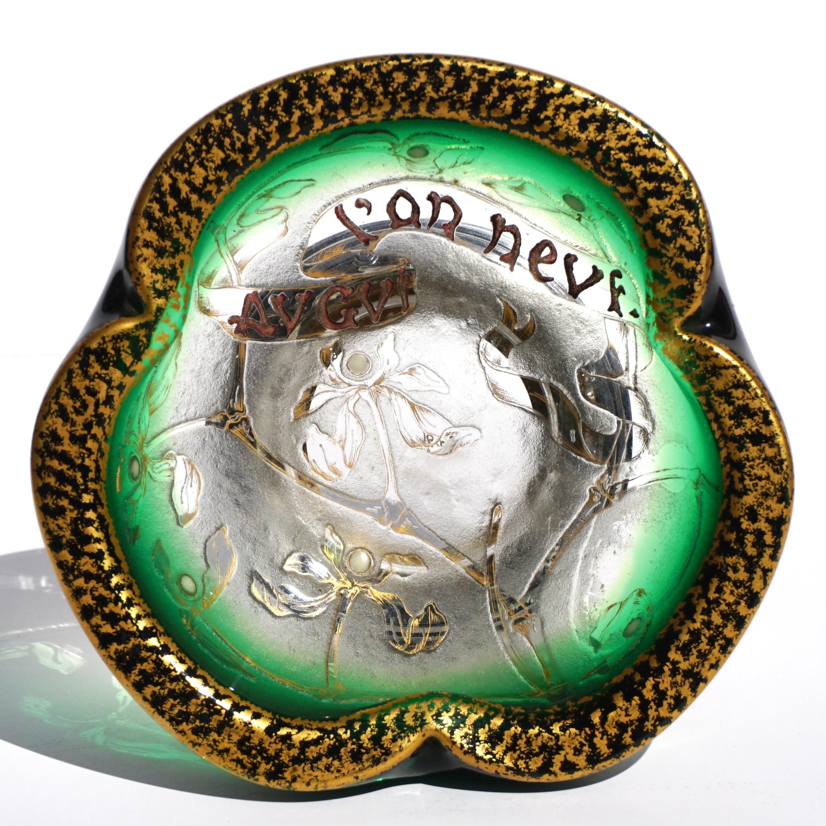 Fine Daum Partial Gilt, Enameled and Acid-Etched Glass “Au Gui L'an Neuf” Bowl with Silver Mount, circa 1895. Art Nouveau Vase Parlant.

Marks: Daum, (Cross of Lorraine), Nancy

Height: 3.5  inches (8.9 cm) Diameter: 5.7 Inches

Thick colorless