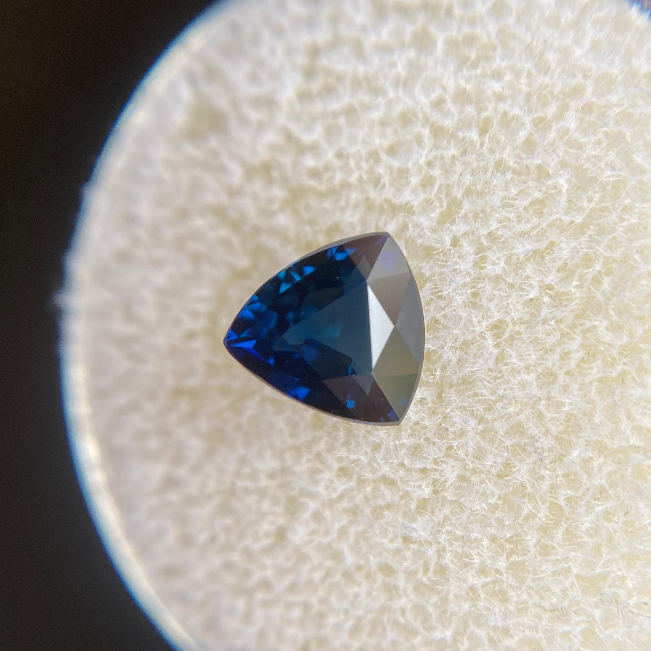 Fine Natural Deep Royal Blue Australian Sapphire.

1.27 Carat with beautiful deep royal blue colour and excellent clarity. A very clean stone, practically flawless. Also has an excellent fancy trillion cut and ideal polish to show great shine and