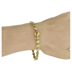 Bracelet à maillons souples en or jaune 18K et diamants fins