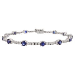 Fine Diamond and Blue Sapphire Engagement Bracelet in 18k Solid White Gold