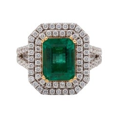 Fine Diamond and Emerald Ring, 18 Karat