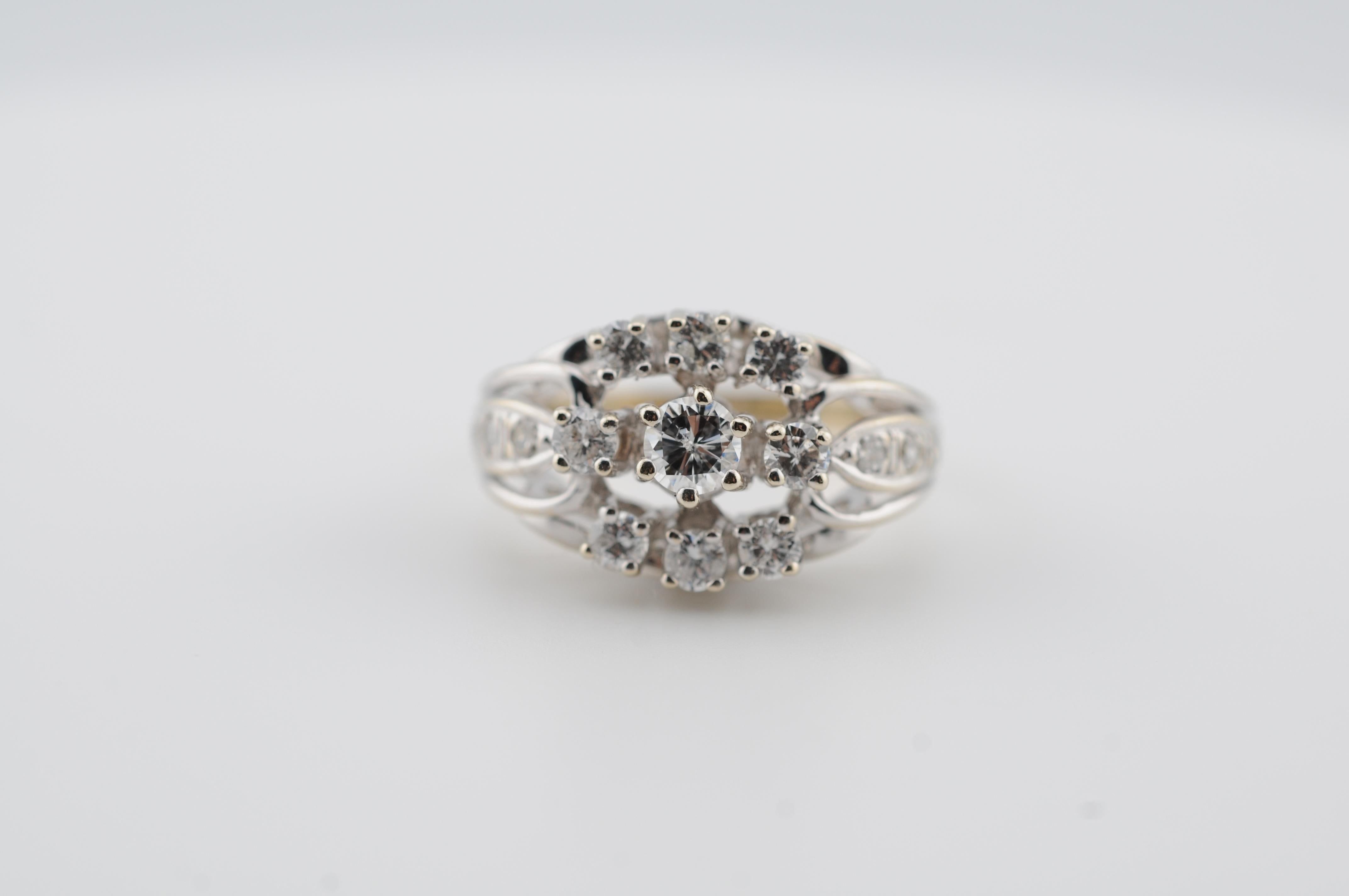 Diamond Cluster Ring – 14K White Gold

An elegant diamond cluster ring crafted in solid 14K white gold, set with 15 brilliant-cut diamonds totaling 0.89 carats. The stones display exceptional quality with VVS1 clarity and E–G color, offering