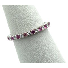 Fine diamond pink sapphire ring in platinum PT950