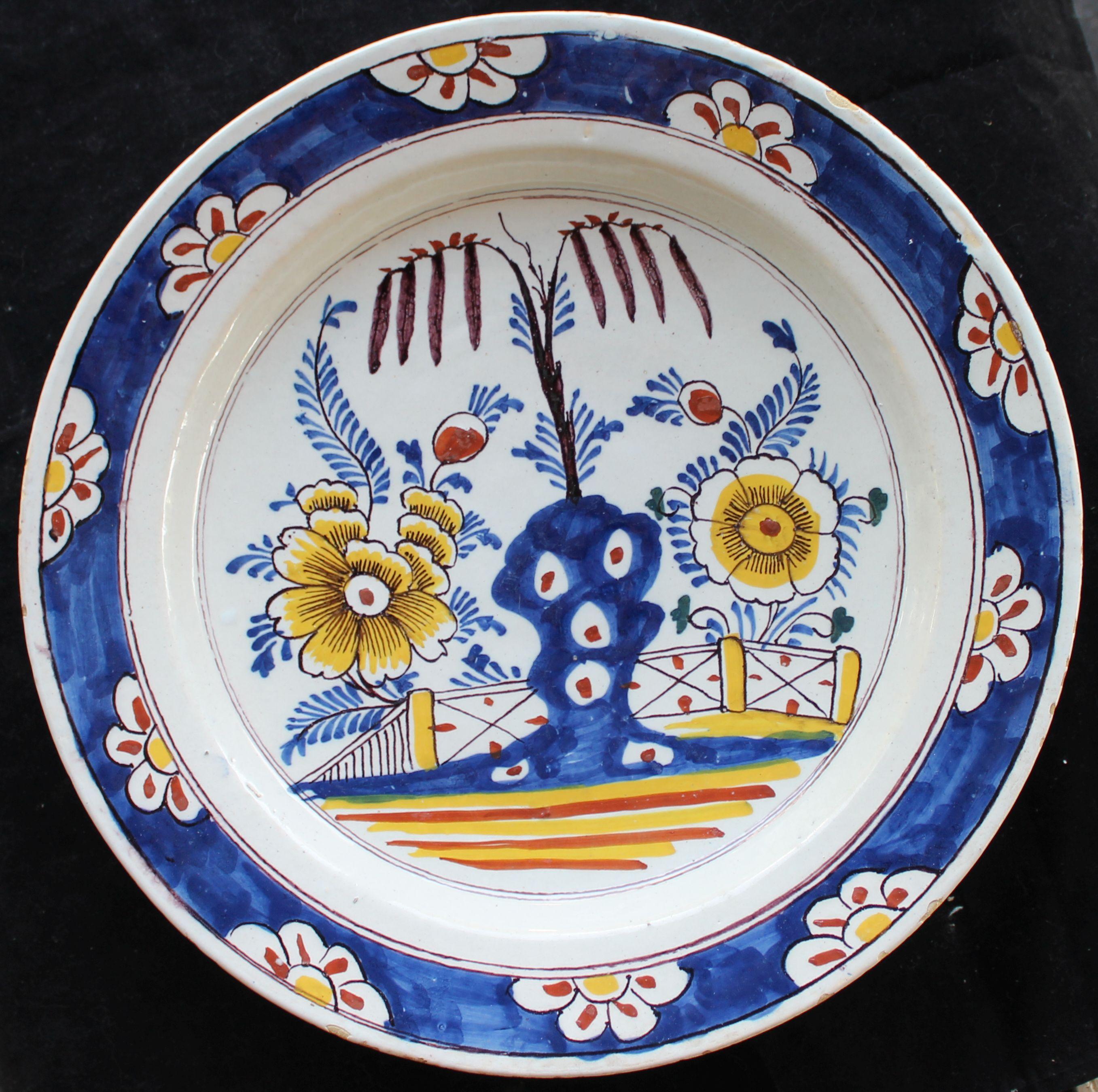 Dutch delftware charger, 1750-1800.
The decoration is a stylised version of an oriental garden on 17th century Chinese porcelain.
Dimensions of the charger: diameter of 12.2 inch / 31 cm
The condition is very good, with beautiful clear glaze.