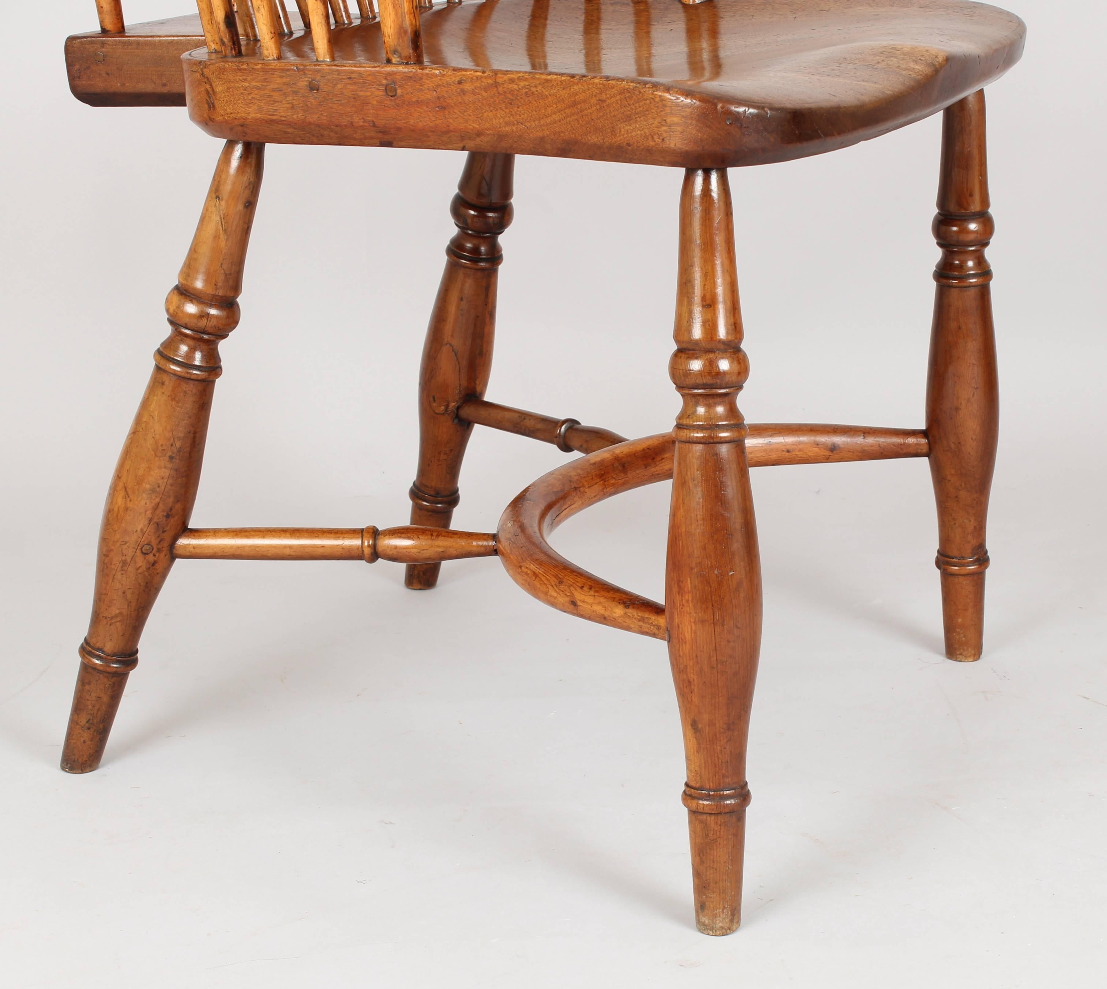 English Fine Early 19th Century Yew wood Comb-Back Windsor Armchair of Good Color