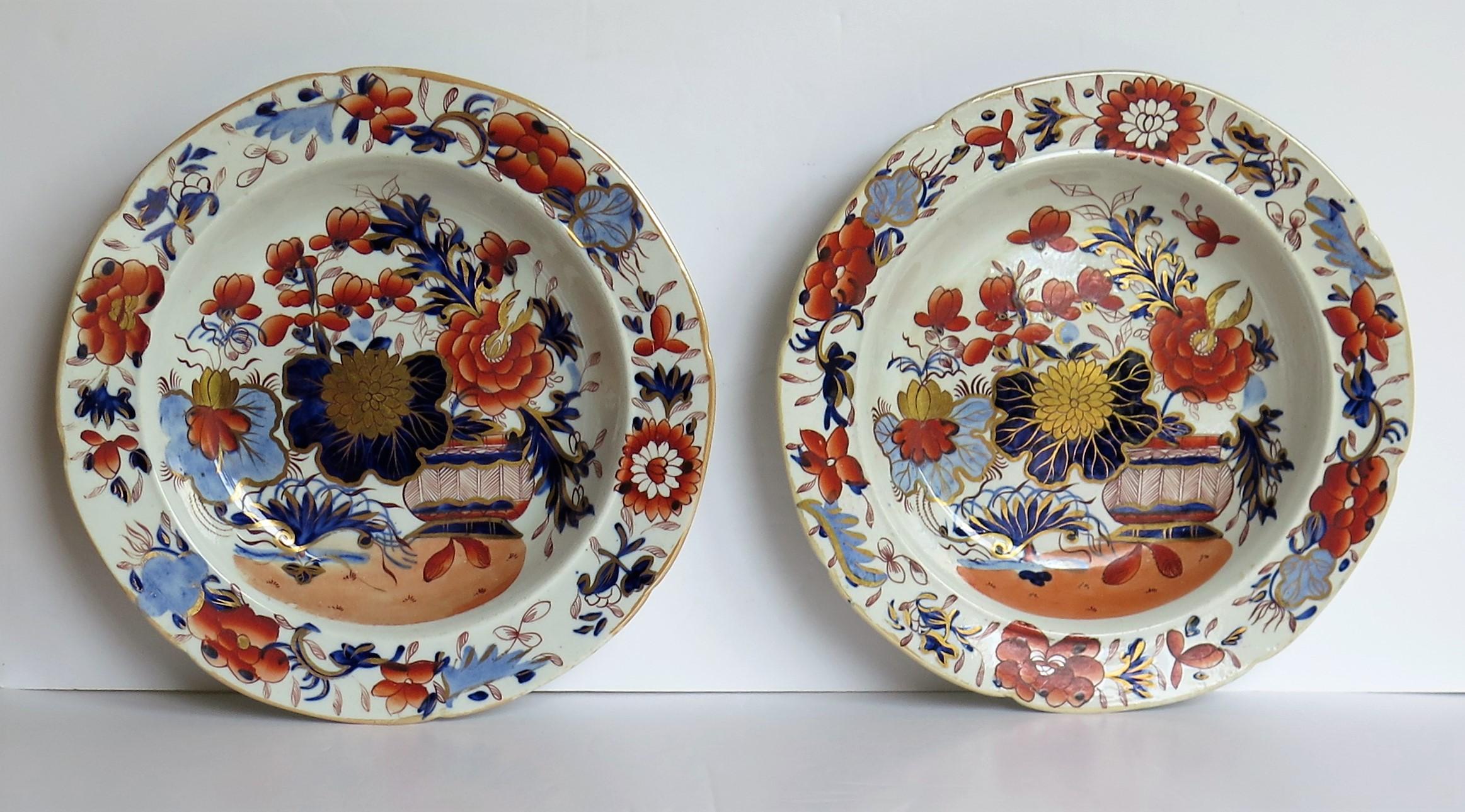 This is a very fine early pair of Mason's Ironstone pottery soup bowls or deep plates, hand painted in the very decorative gilded basket Japan pattern, produced by the Mason's factory at Lane Delph, Staffordshire, England, in the George 111rd