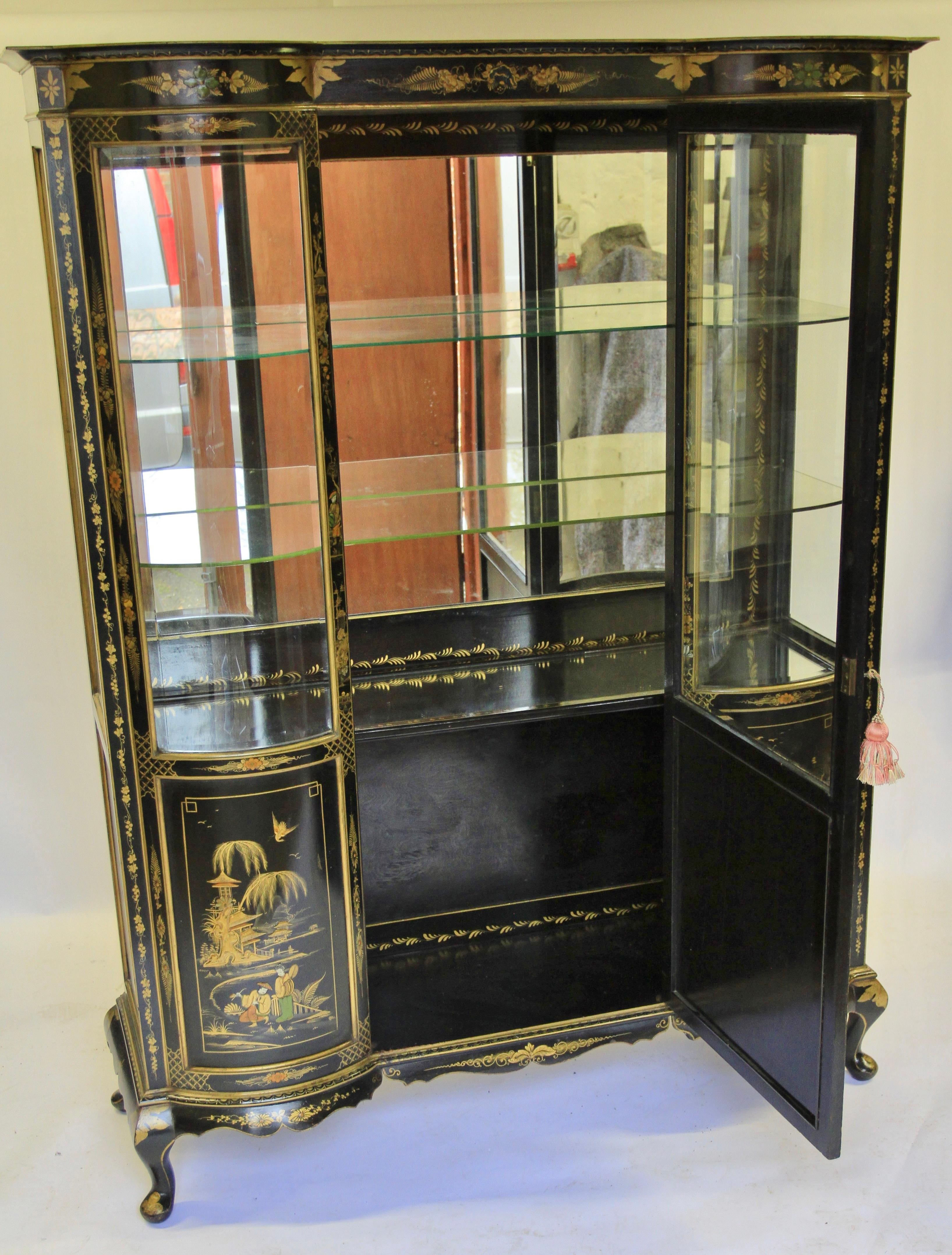 Fine Edwardian Chinoiserie Decorated Display Cabinet 
Black & Gold Decoration, 
Moulded & Shaped cornice, 
Single Centre Door with three quarter glazed Bevelled Glass, 
Chinoiserie panel beneath
Pair Bowfronted 3 quarter glazed Bevelled glass panels
