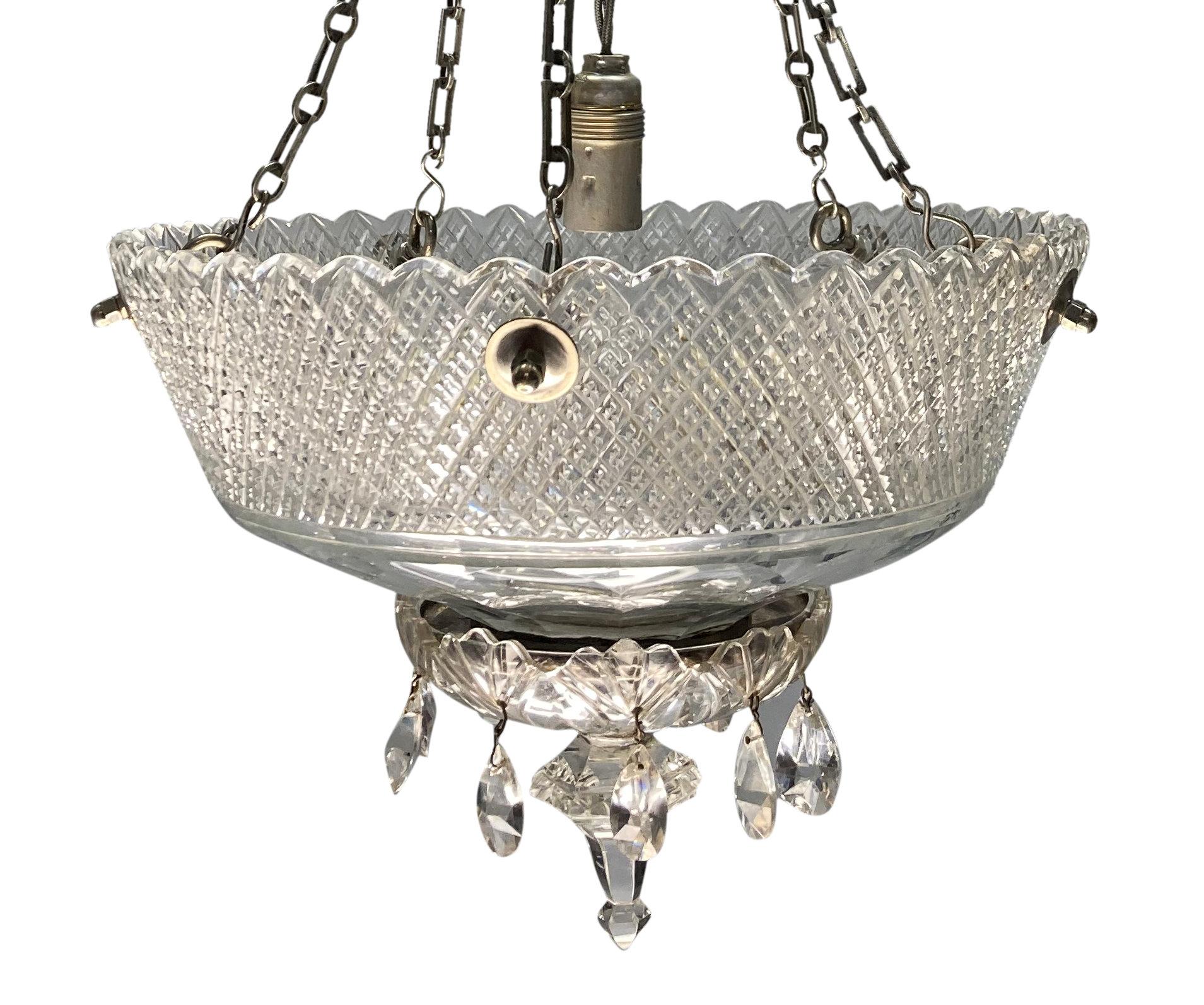 A fine English Edwardian cut glass dish light, with silver plated bronze chains and fittings.