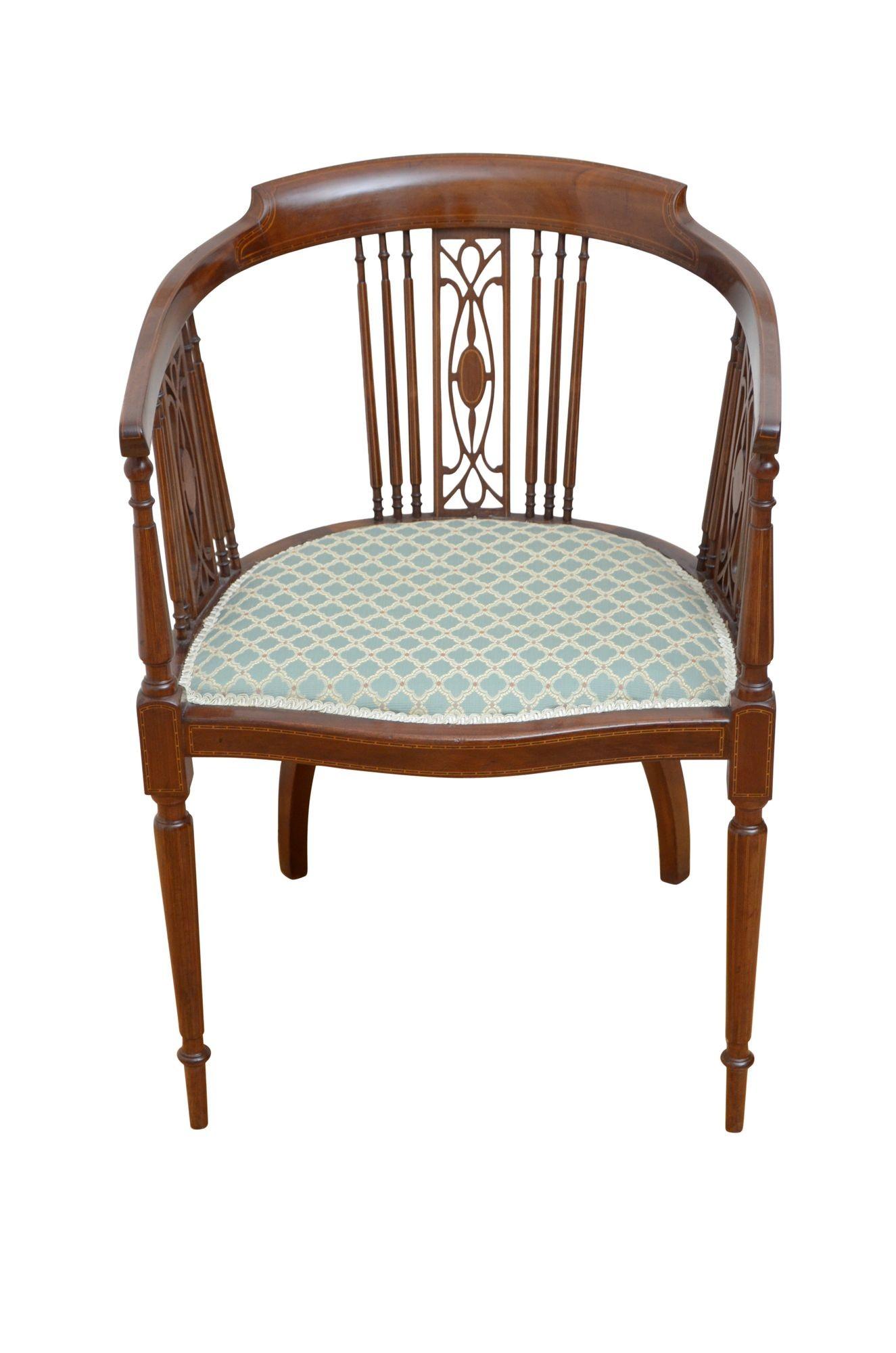 0259 Fine example of Edwardian mahogany occasional chair in mahogany, having shaped and string inlaid top rail supported on carved and inlaid uprights and fine string inlaid spindles above serpentine seat, all standing on slender satinwood string