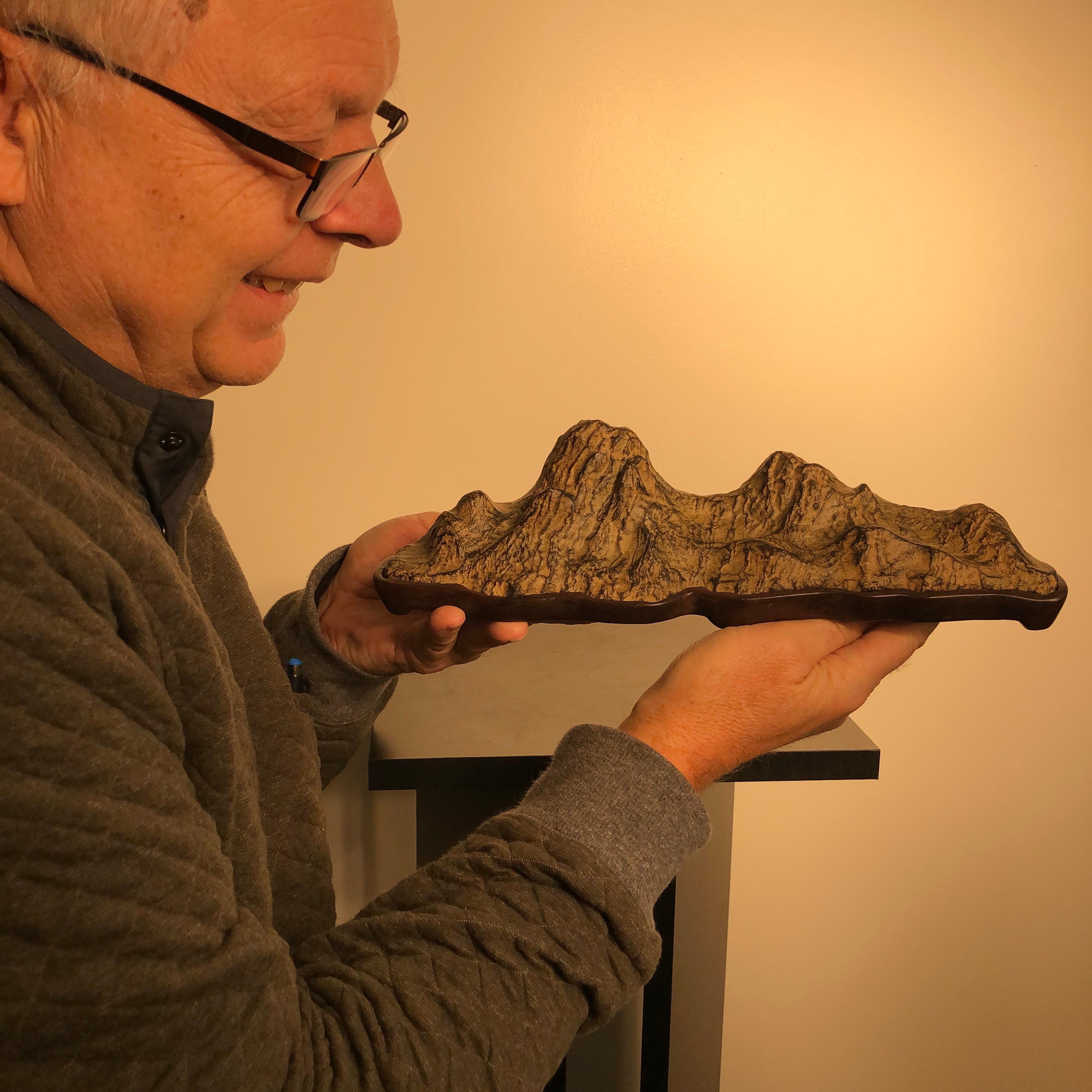Fantastic tall mountain scholar rock, natural bonsai suiseki with eight high peaks and 10 inches long

What do you see- mountains, trails in the Rockies or Himalayas?

Here's a great one-of-a-kind sculptural candidate for your special Asian room