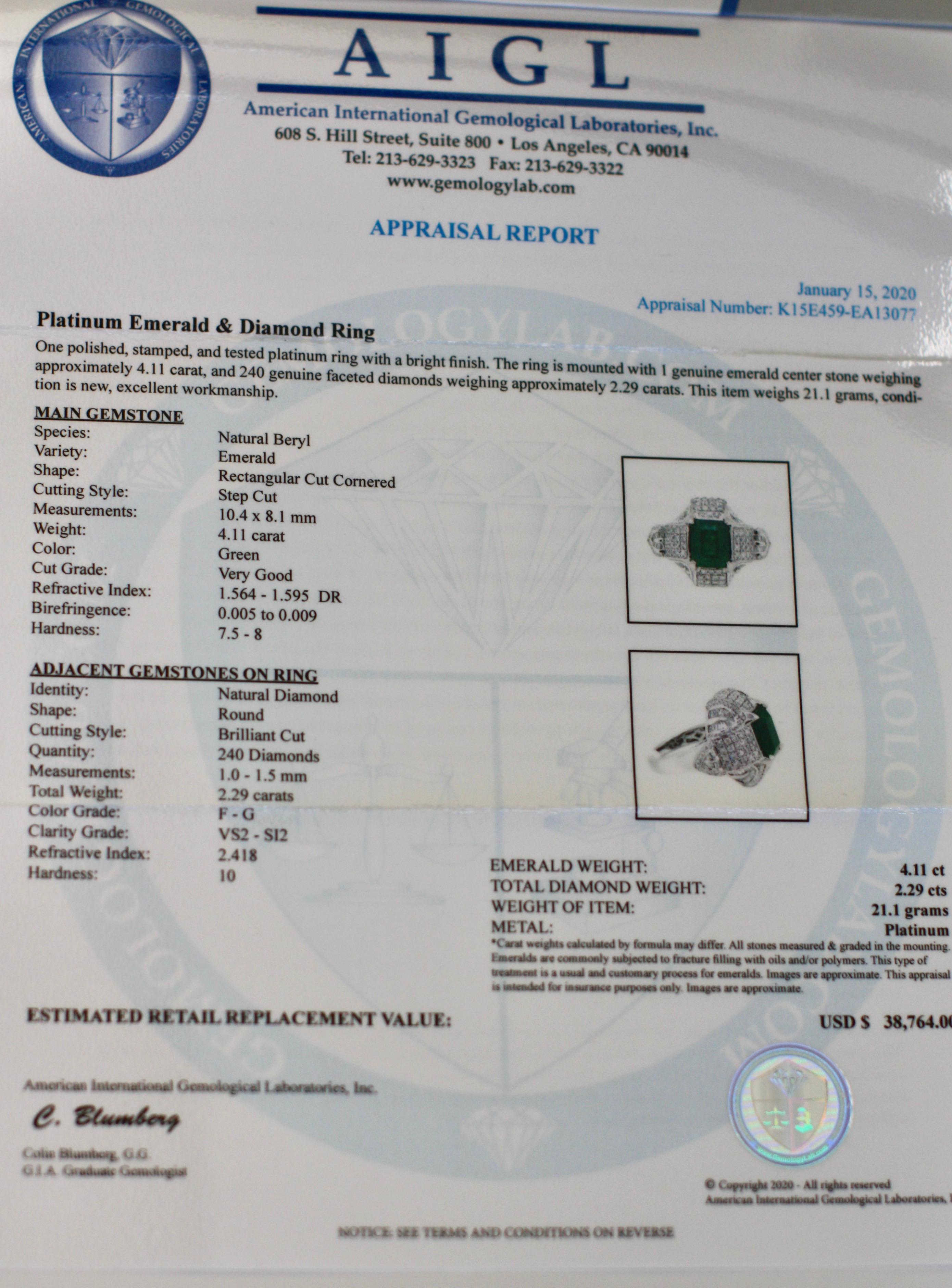 Fine Emerald and Diamond Ring 
Centered by an emerald-shaped emerald weighing approx. 4.11 carats, set with faceted diamonds weighing approx. 2.29 carats, 
mounted in platinum 
13.6 DWT (gross) , size 7 

Accompanied by 
AIGL paperwork 