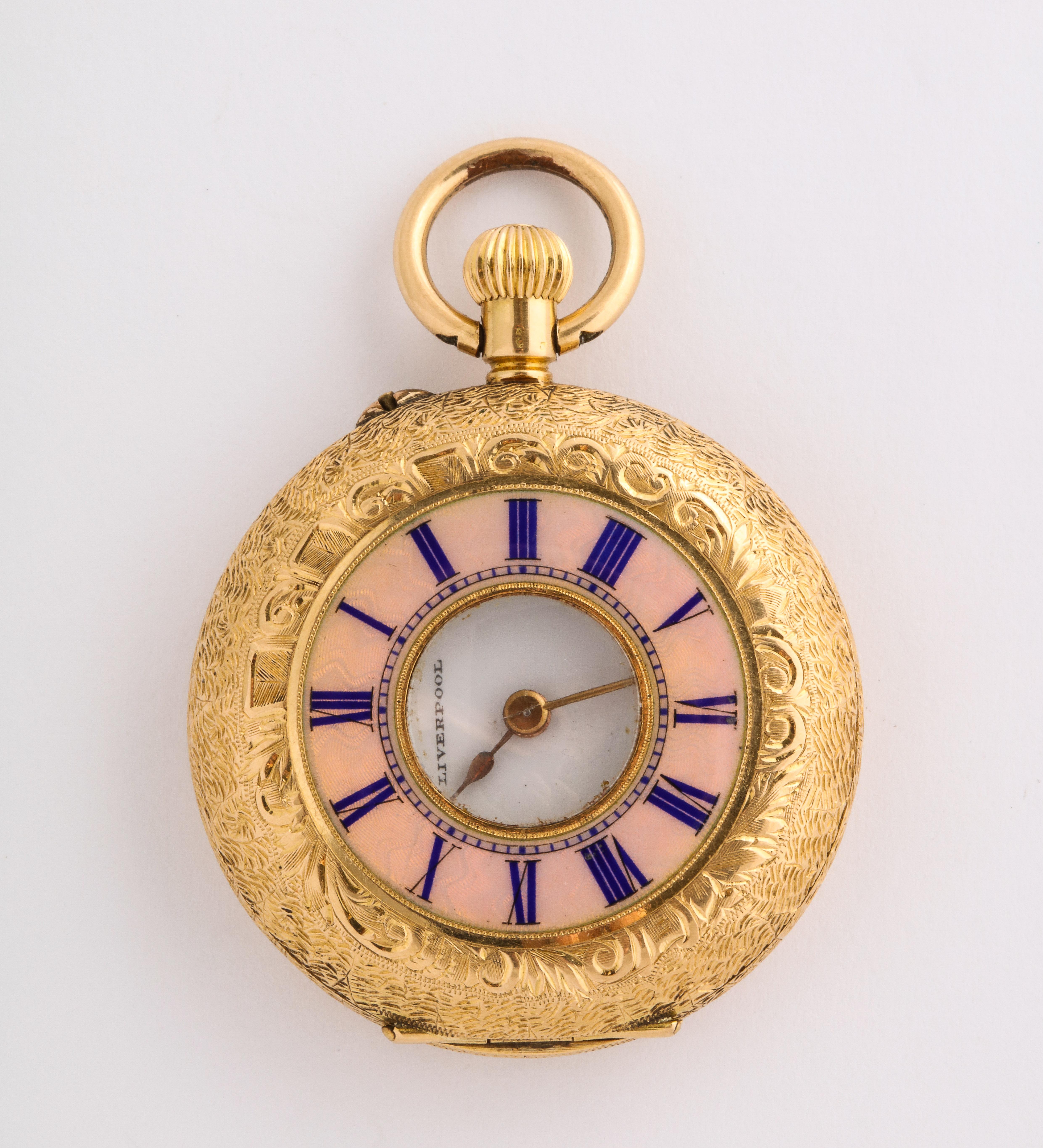 Beautiful 18k gold guilloché enameled half hunter fully engraved case, pocket watch. An elegant timepiece, the roman chapters in dark blue enamel against a salmon pink guilloché enamel ring, the case has a window in the middle, allowing the user to