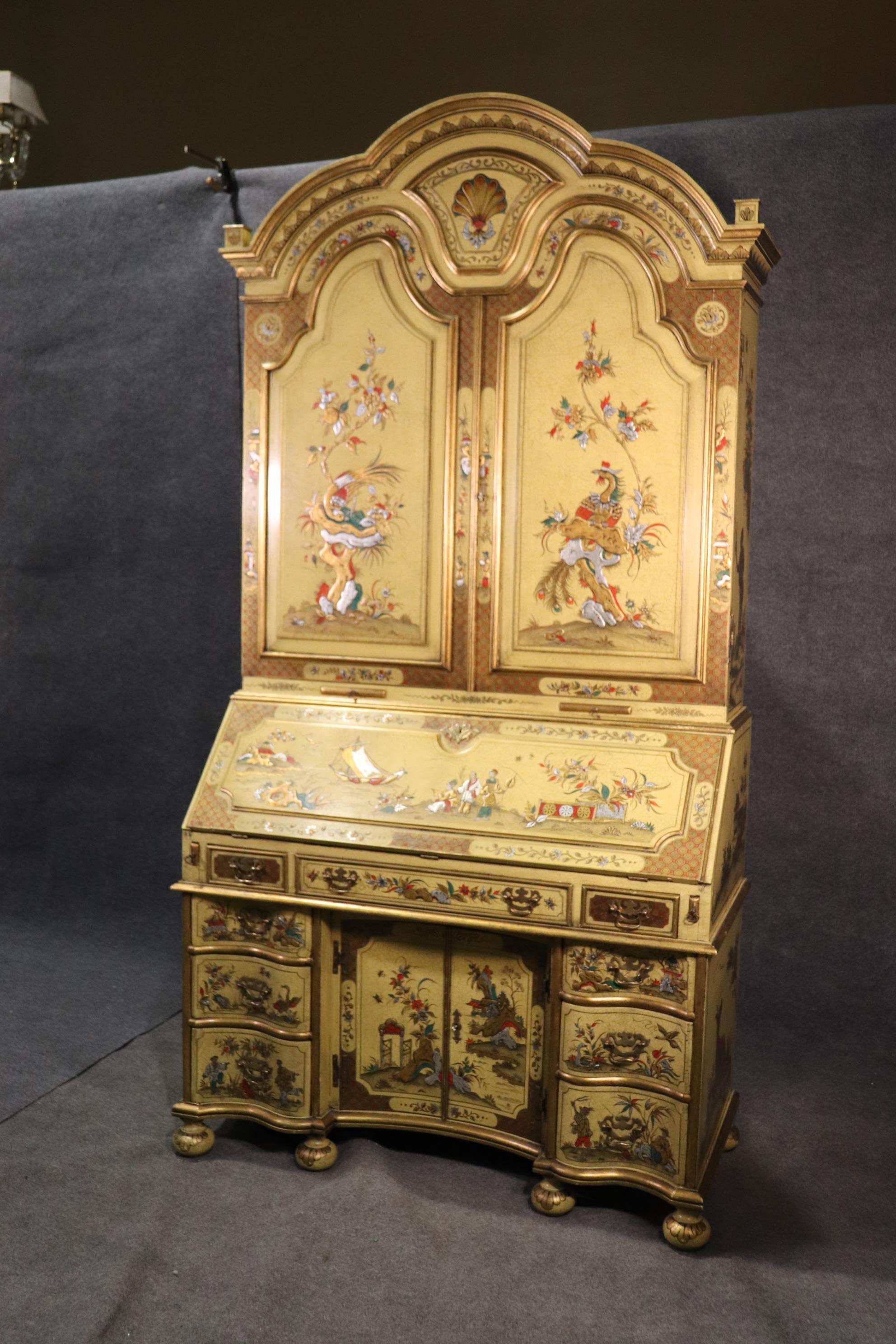 This is a handmade secretary desk that is one of the most beautiful we have ever had, in terms of color, and in terms of the fantastic design of the case. The desk features figures and scenes of China that are beautifully hand painted and decorated.