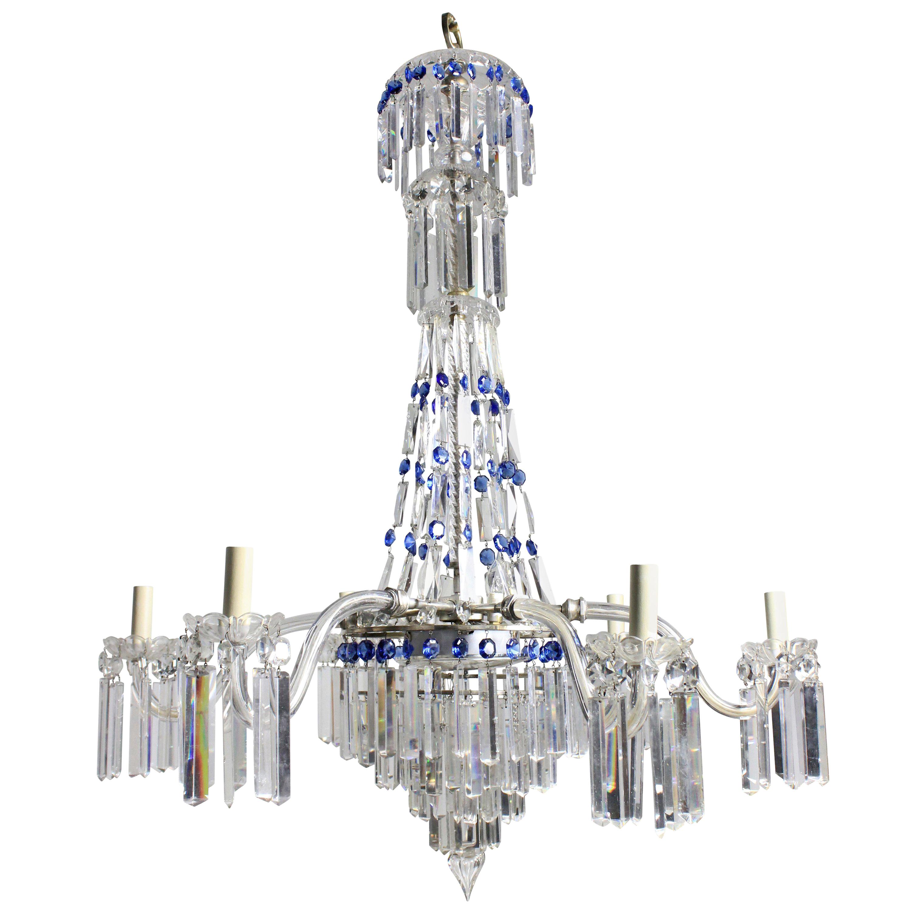 A fine English cut-glass tent and waterfall chandelier with blue glass detailing. Formerly a gasolier.