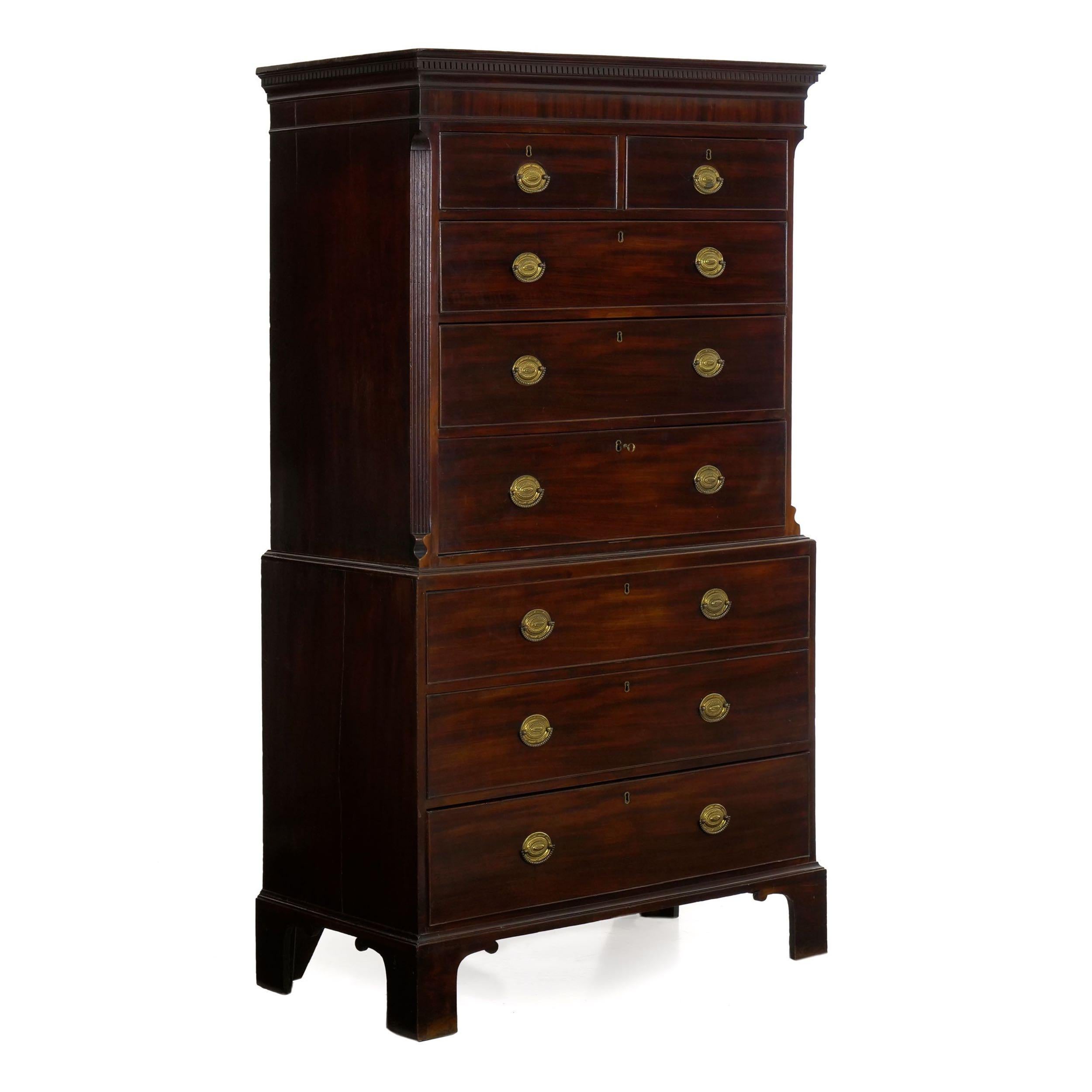 GEORGE III MAHOGANY CHEST ON CHEST
England, circa 1800
Item # 905KUB29A

Crafted of a dark and dense mahogany, both in the solid and veneer forms, this excellent George III period chest on chest has a lovely overall surface patination built up from