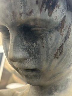 Fine English or Continental solid lead fountain figure of a boy holding a shell
